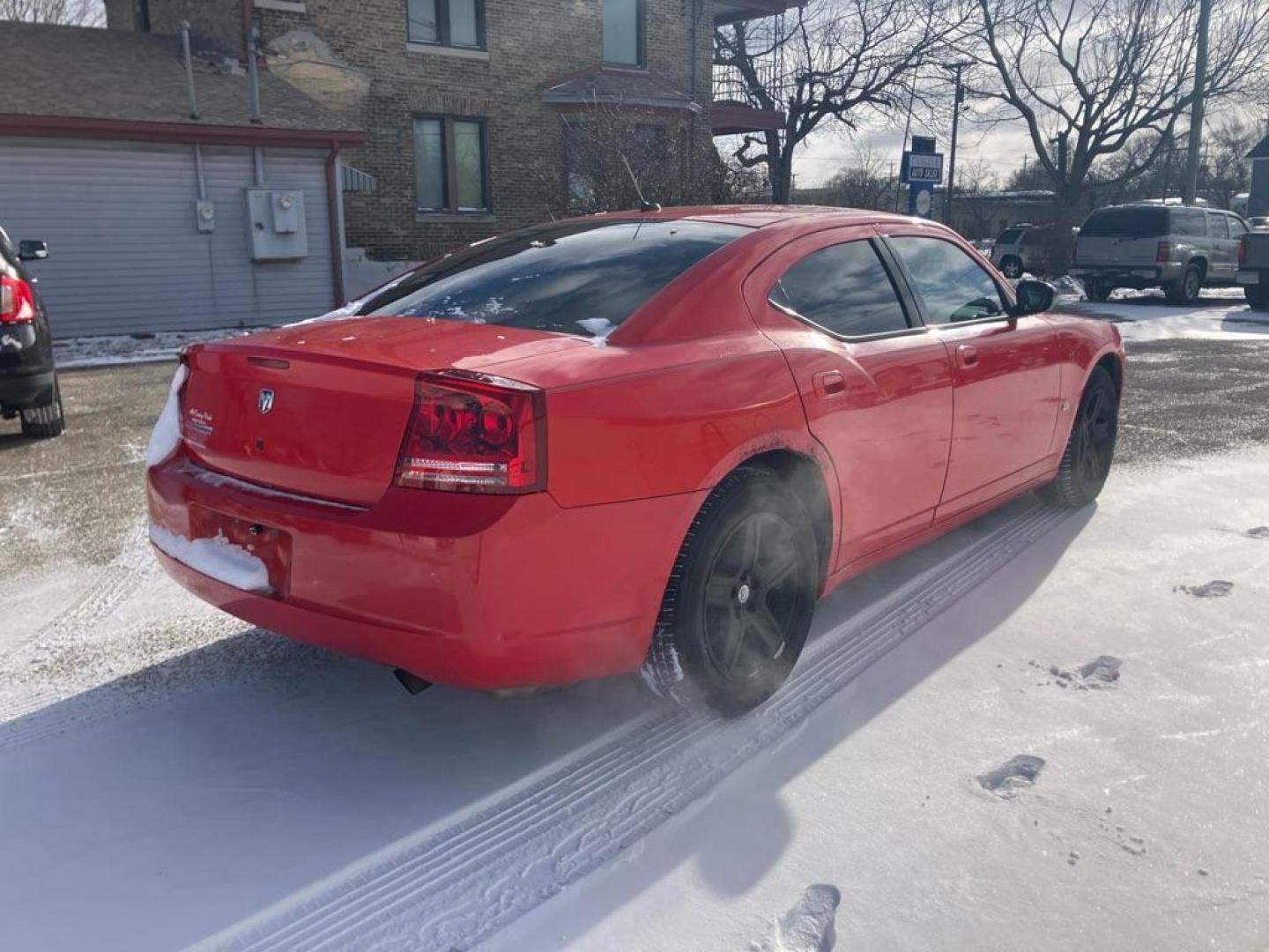 2008 RED DODGE CHARGER (2B3KA43G38H) with an 3.5L engine, Automatic transmission, located at 1708 Broadway, Rockford, IL, 61104, (815) 397-5010, 42.252522, -89.069359 - Photo#2