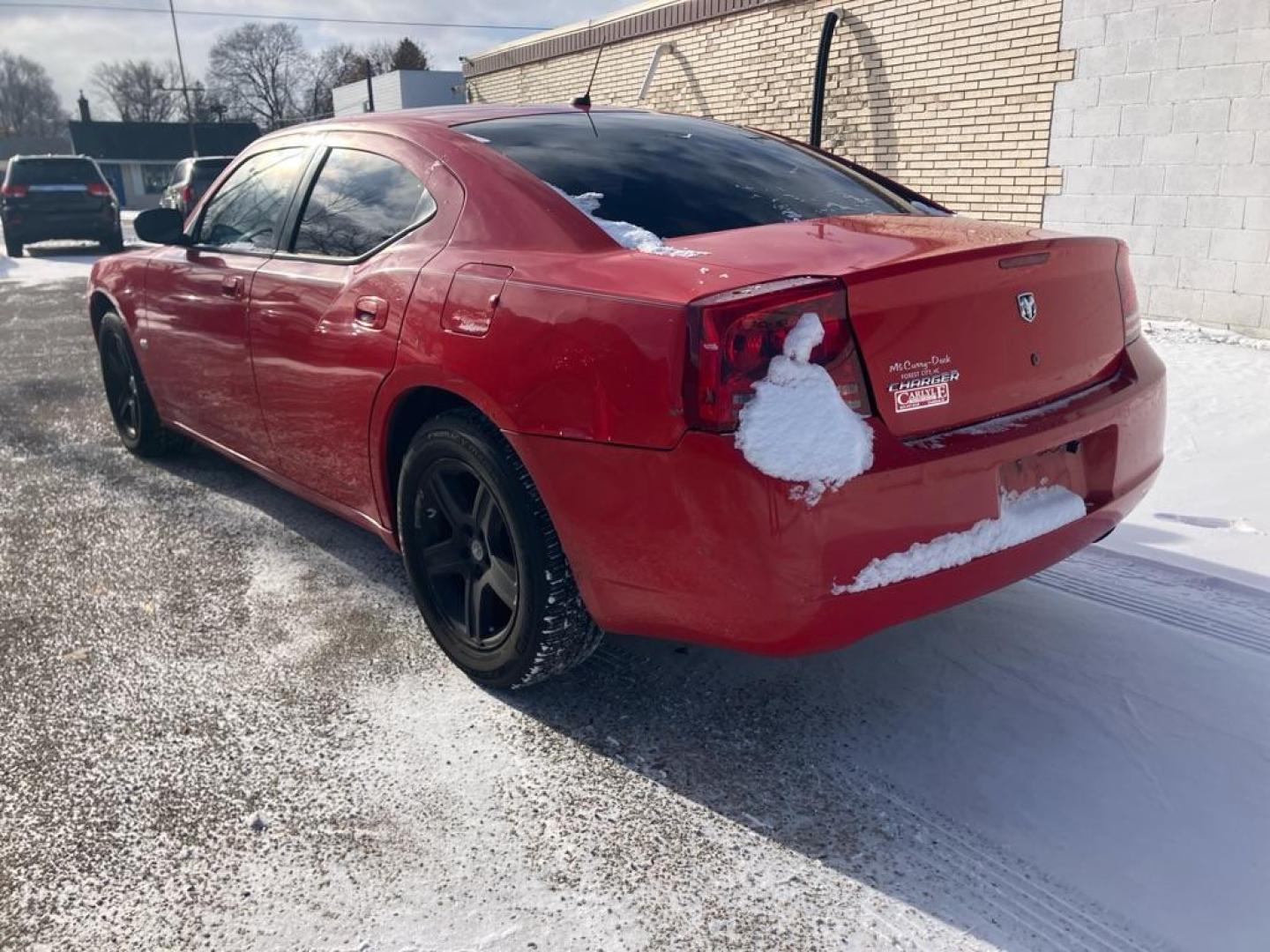 2008 RED DODGE CHARGER (2B3KA43G38H) with an 3.5L engine, Automatic transmission, located at 1708 Broadway, Rockford, IL, 61104, (815) 397-5010, 42.252522, -89.069359 - Photo#3