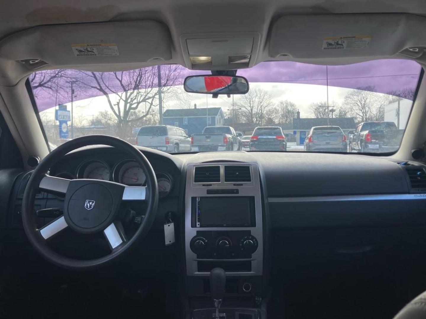 2008 RED DODGE CHARGER (2B3KA43G38H) with an 3.5L engine, Automatic transmission, located at 1708 Broadway, Rockford, IL, 61104, (815) 397-5010, 42.252522, -89.069359 - Photo#5