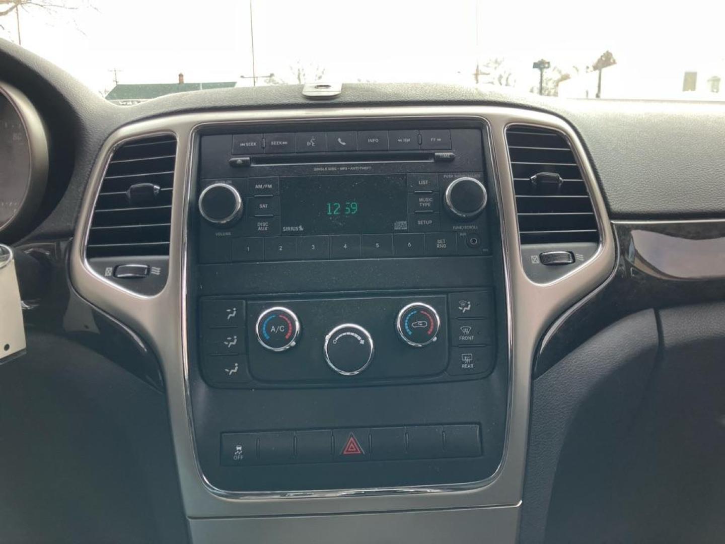 2012 BLACK JEEP GRAND CHEROKEE LAREDO (1C4RJFAG4CC) with an 3.6L engine, Automatic transmission, located at 1708 Broadway, Rockford, IL, 61104, (815) 397-5010, 42.252522, -89.069359 - Photo#8