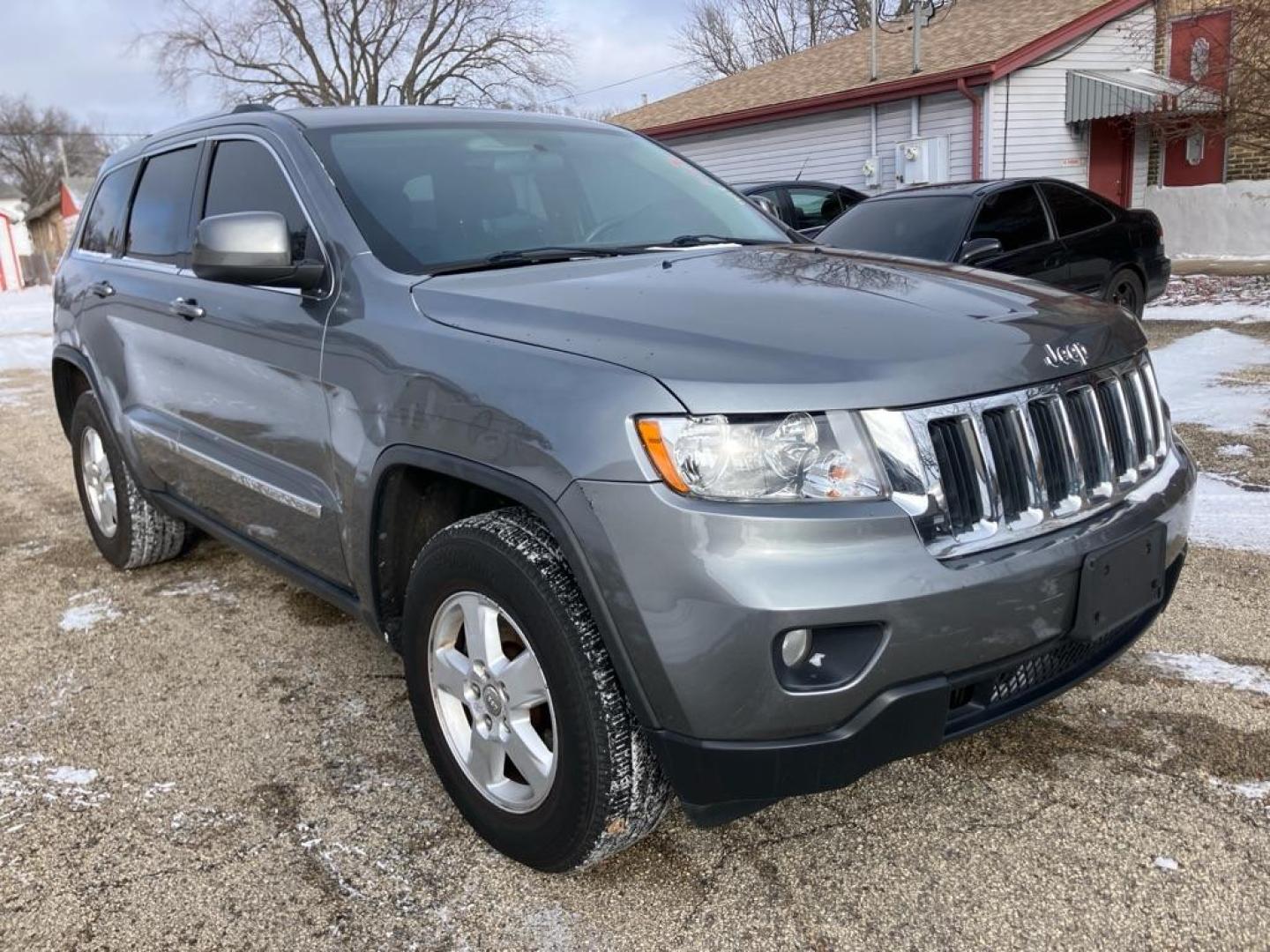 2012 GRAY JEEP GRAND CHEROKEE LAREDO (1C4RJFAG2CC) with an 3.6L engine, Automatic transmission, located at 1708 Broadway, Rockford, IL, 61104, (815) 397-5010, 42.252522, -89.069359 - Photo#1