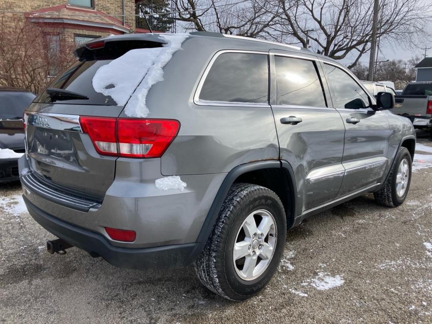 2012 GRAY JEEP GRAND CHEROKEE LAREDO (1C4RJFAG2CC) with an 3.6L engine, Automatic transmission, located at 1708 Broadway, Rockford, IL, 61104, (815) 397-5010, 42.252522, -89.069359 - Photo#2