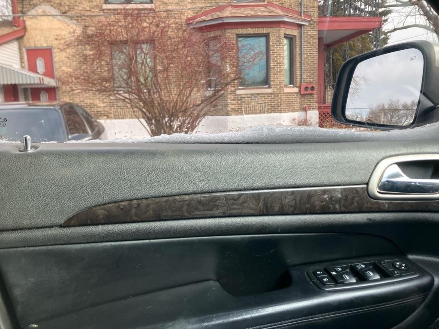 2012 GRAY JEEP GRAND CHEROKEE LAREDO (1C4RJFAG2CC) with an 3.6L engine, Automatic transmission, located at 1708 Broadway, Rockford, IL, 61104, (815) 397-5010, 42.252522, -89.069359 - Photo#6