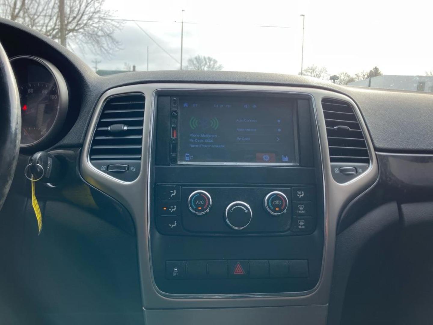 2012 GRAY JEEP GRAND CHEROKEE LAREDO (1C4RJFAG2CC) with an 3.6L engine, Automatic transmission, located at 1708 Broadway, Rockford, IL, 61104, (815) 397-5010, 42.252522, -89.069359 - Photo#8