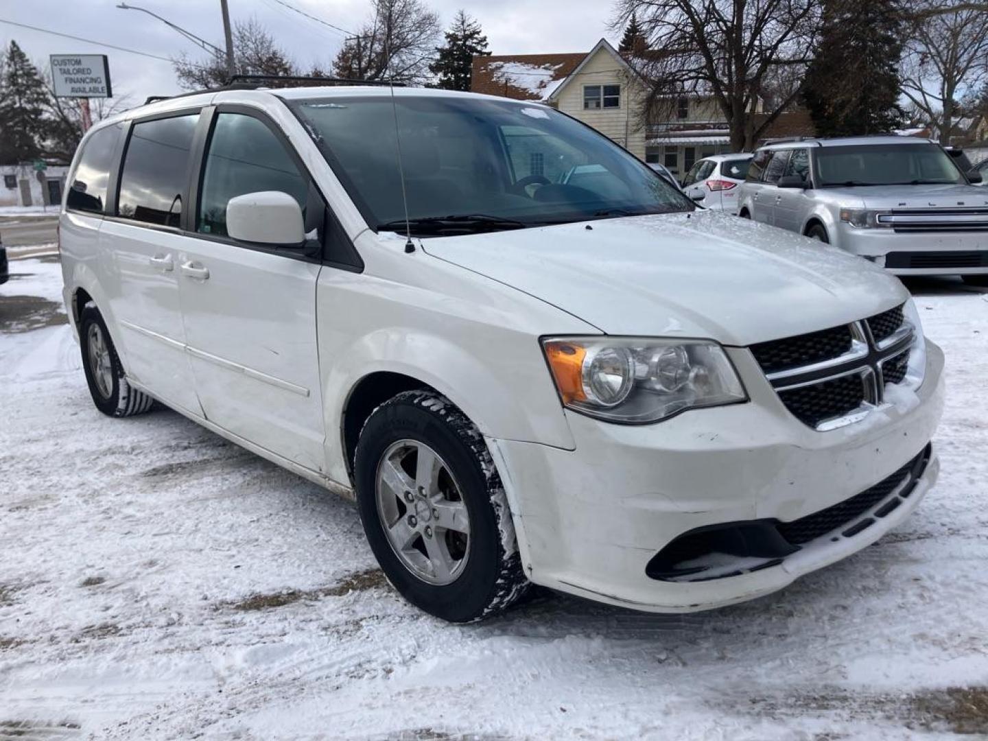 2012 WHITE DODGE GRAND CARAVAN SXT (2C4RDGCG9CR) with an 3.6L engine, Automatic transmission, located at 1708 Broadway, Rockford, IL, 61104, (815) 397-5010, 42.252522, -89.069359 - Photo#1