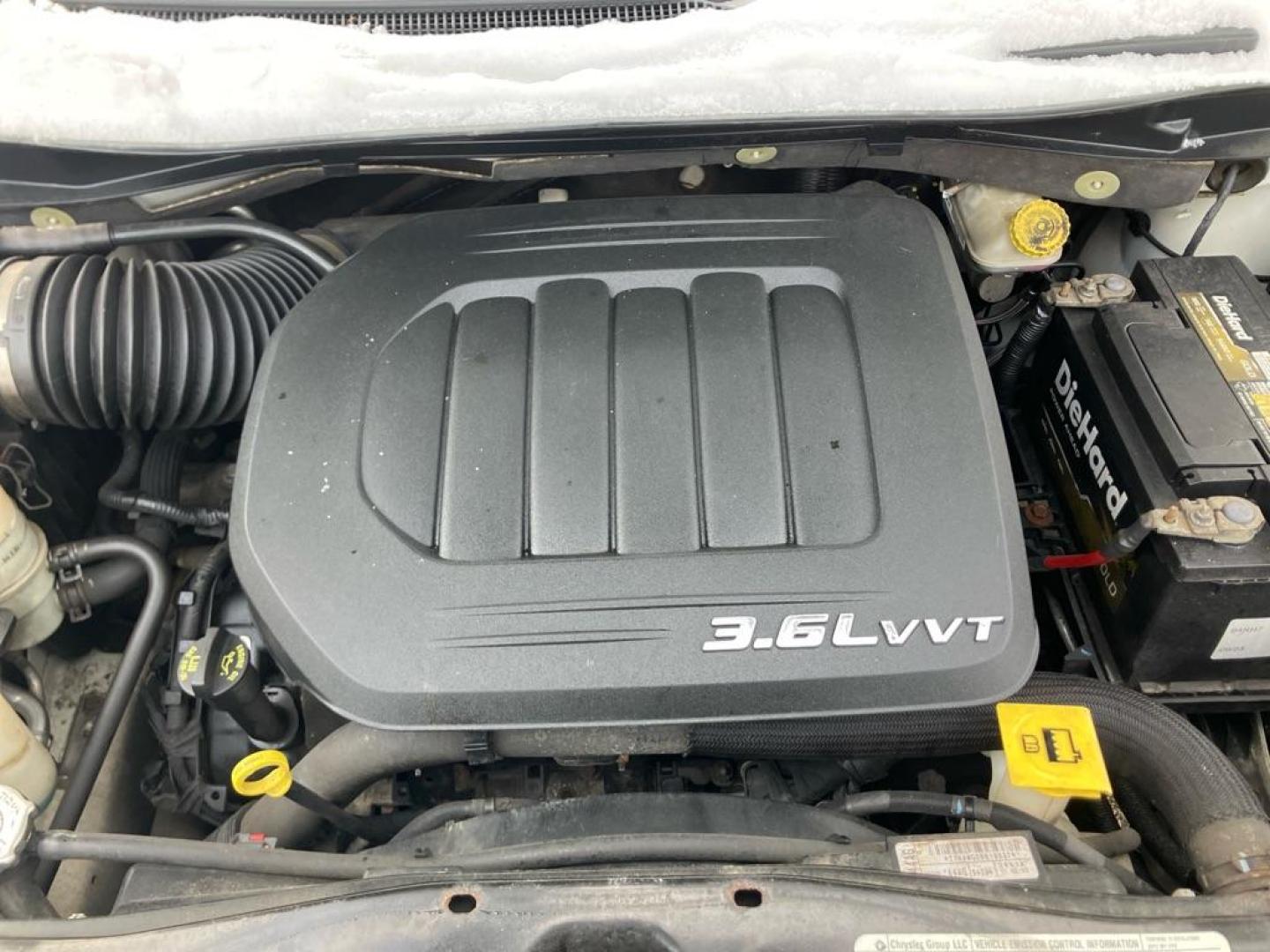 2012 WHITE DODGE GRAND CARAVAN SXT (2C4RDGCG9CR) with an 3.6L engine, Automatic transmission, located at 1708 Broadway, Rockford, IL, 61104, (815) 397-5010, 42.252522, -89.069359 - Photo#10