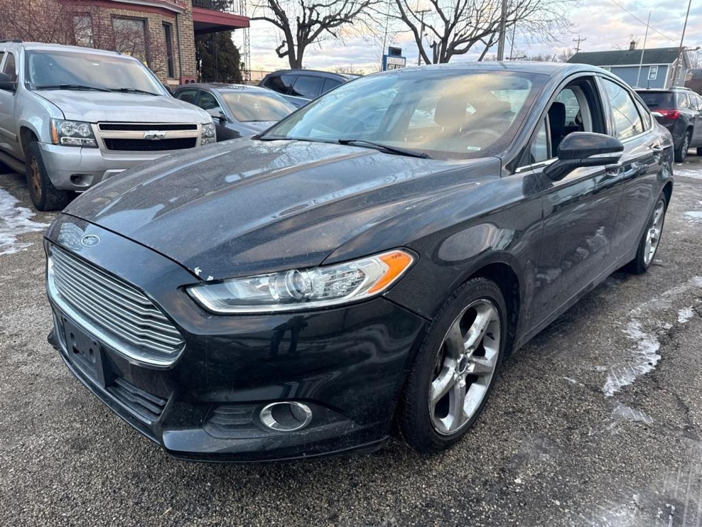 2014 BLACK FORD FUSION SE (3FA6P0H72ER) with an 2.5L engine, Automatic transmission, located at 1708 Broadway, Rockford, IL, 61104, (815) 397-5010, 42.252522, -89.069359 - Photo#0