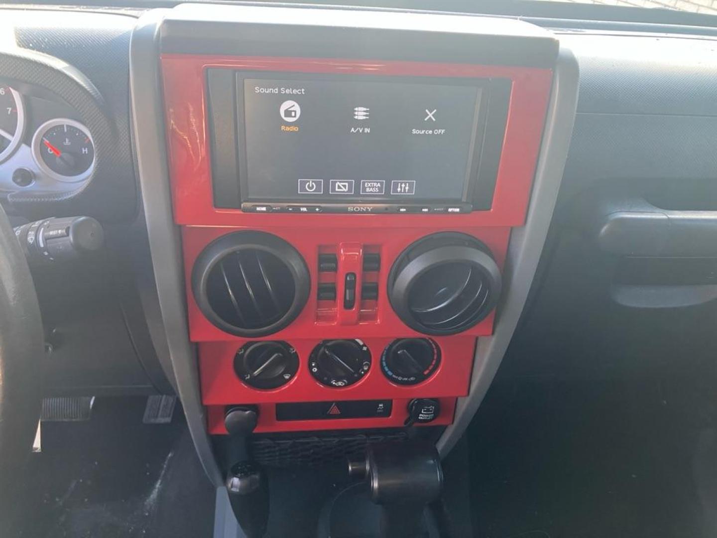 2010 RED JEEP WRANGLER UNLIMI SPORT (1J4BA3H19AL) with an 3.8L engine, Automatic transmission, located at 1708 Broadway, Rockford, IL, 61104, (815) 397-5010, 42.252522, -89.069359 - Photo#8