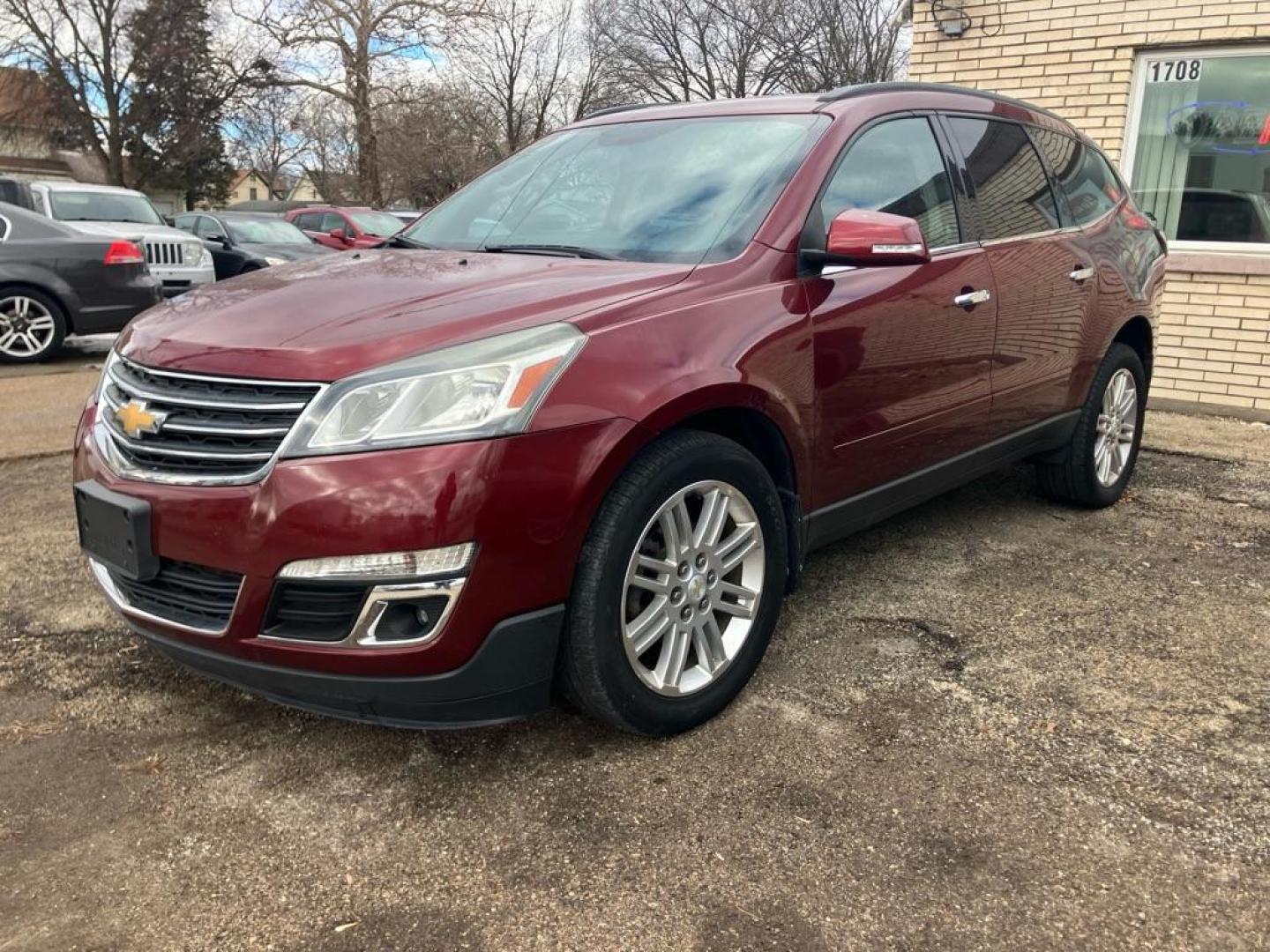 2015 RED CHEVROLET TRAVERSE LT (1GNKRGKD9FJ) with an 3.6L engine, Automatic transmission, located at 1708 Broadway, Rockford, IL, 61104, (815) 397-5010, 42.252522, -89.069359 - Photo#0