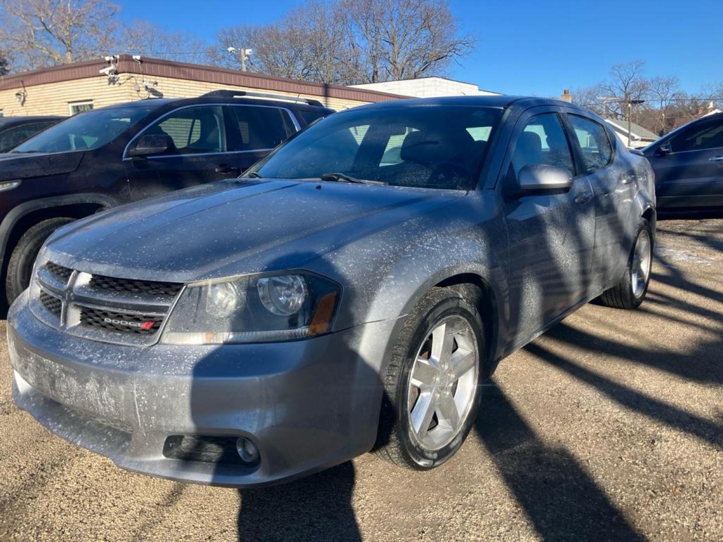 2014 SILVER DODGE AVENGER SXT (1C3CDZCBXEN) with an 2.4L engine, Automatic transmission, located at 1708 Broadway, Rockford, IL, 61104, (815) 397-5010, 42.252522, -89.069359 - Photo#1