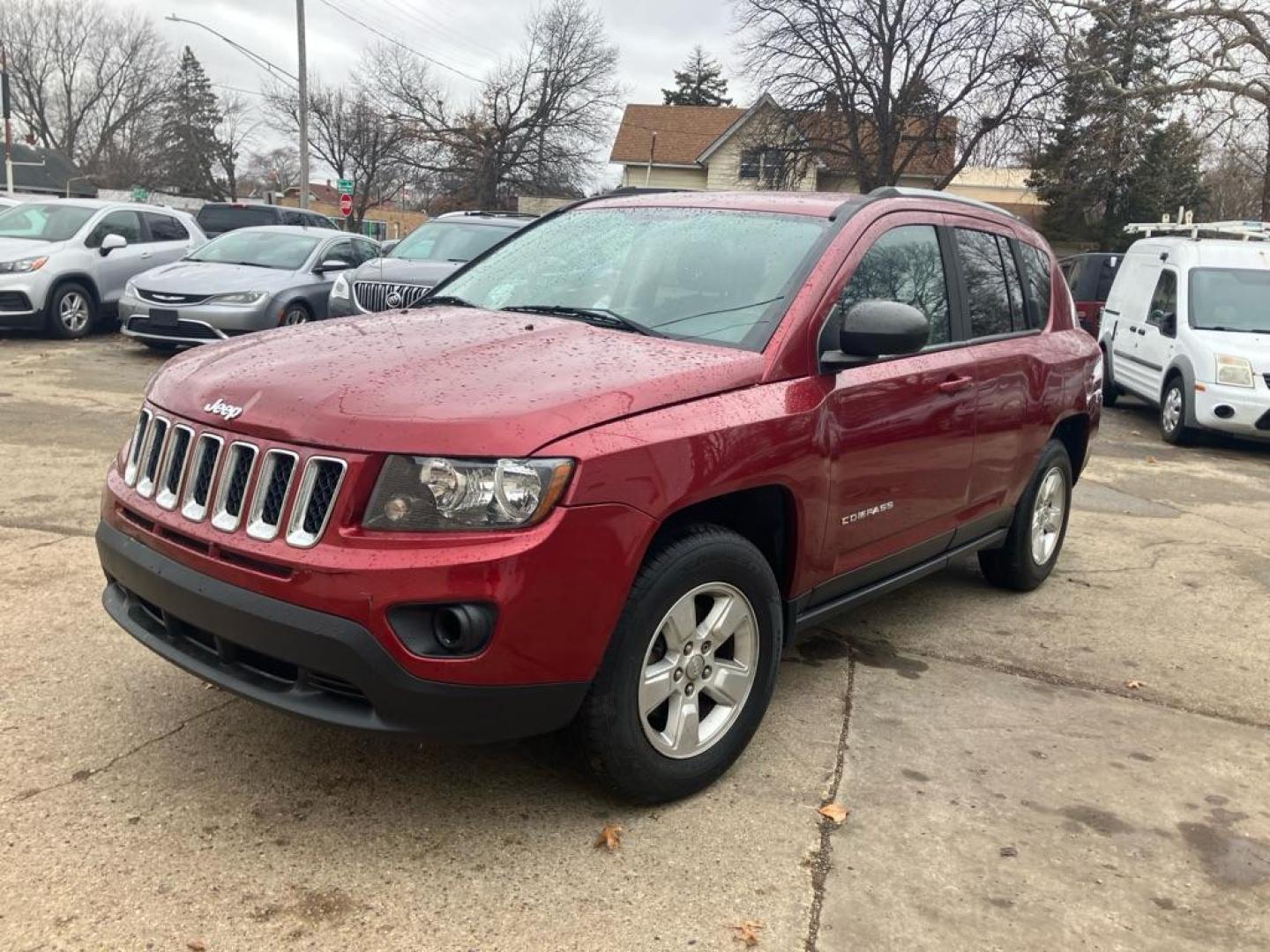 2016 RED JEEP COMPASS SPORT (1C4NJCBA9GD) with an 2.0L engine, Continuously Variable transmission, located at 1708 Broadway, Rockford, IL, 61104, (815) 397-5010, 42.252522, -89.069359 - Photo#0