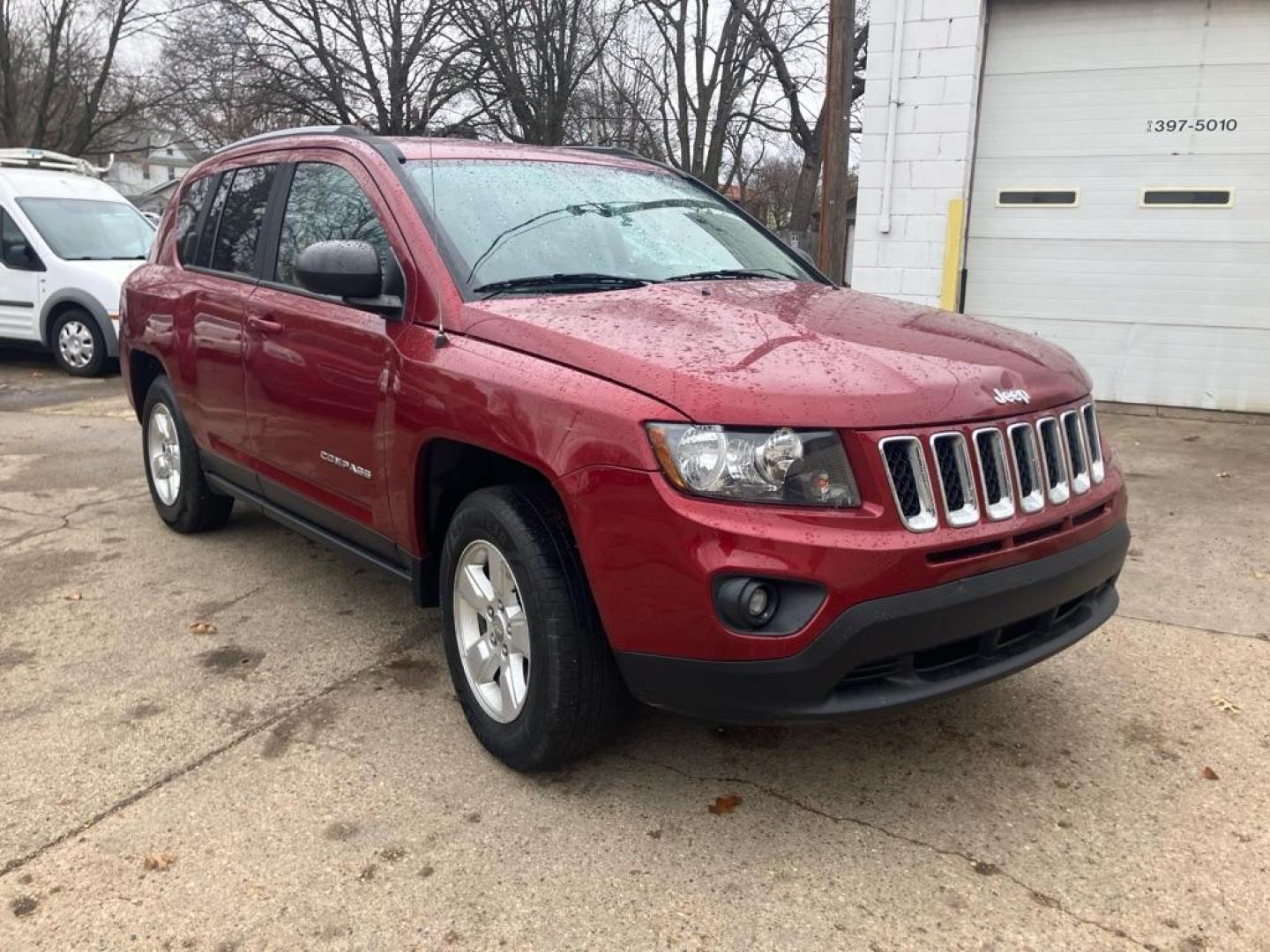 2016 RED JEEP COMPASS SPORT (1C4NJCBA9GD) with an 2.0L engine, Continuously Variable transmission, located at 1708 Broadway, Rockford, IL, 61104, (815) 397-5010, 42.252522, -89.069359 - Photo#1