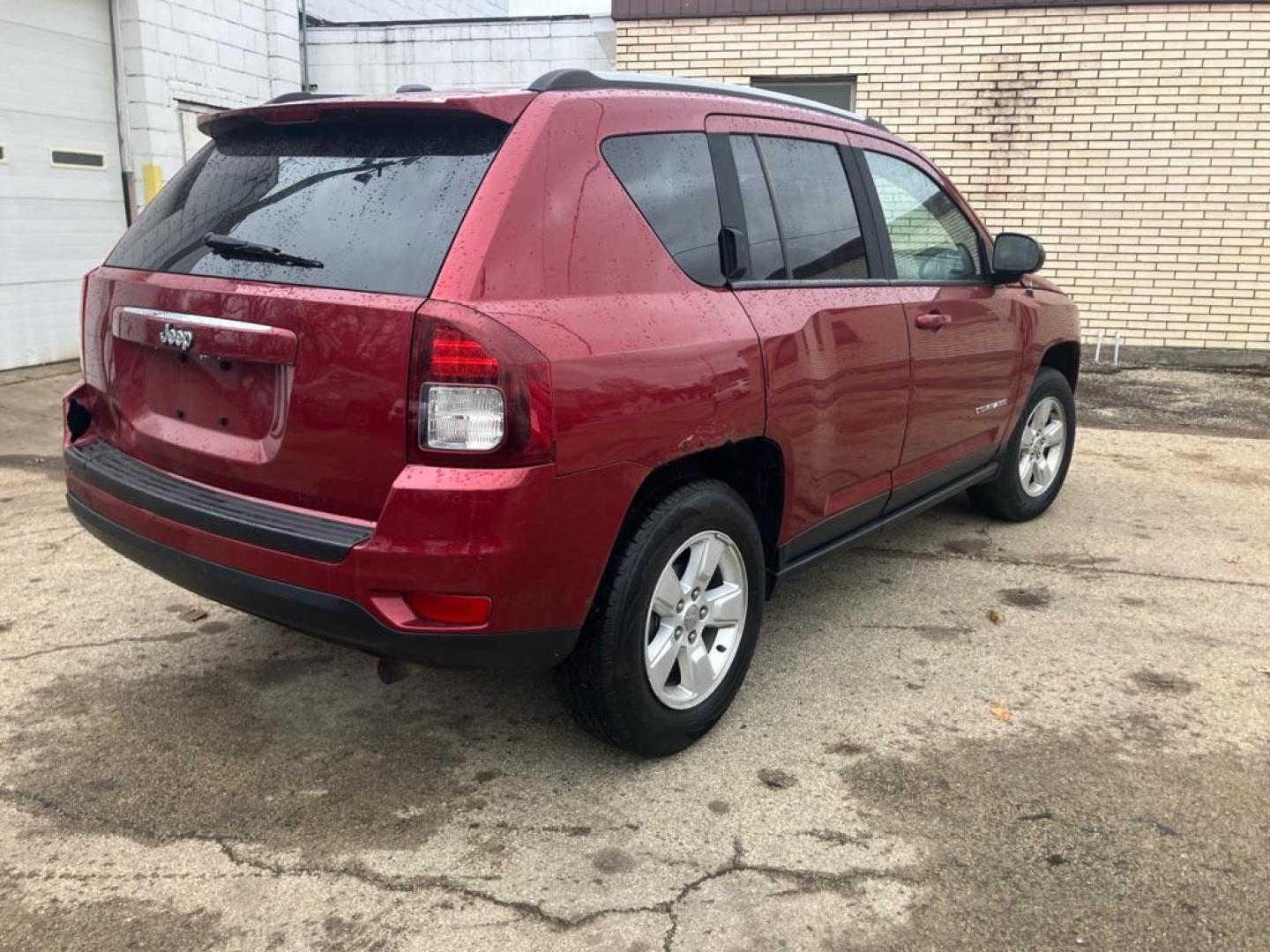 2016 RED JEEP COMPASS SPORT (1C4NJCBA9GD) with an 2.0L engine, Continuously Variable transmission, located at 1708 Broadway, Rockford, IL, 61104, (815) 397-5010, 42.252522, -89.069359 - Photo#2