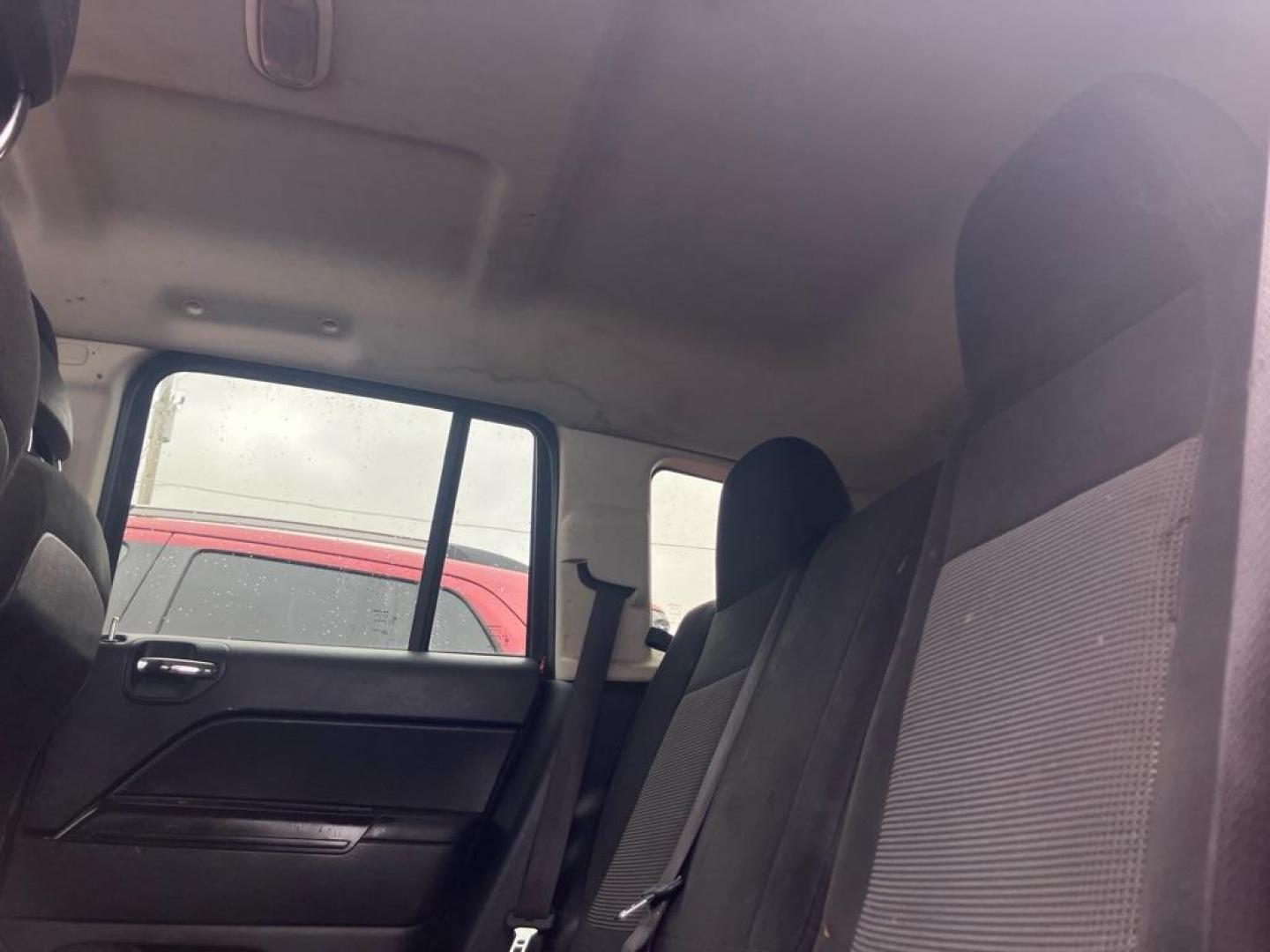 2016 RED JEEP COMPASS SPORT (1C4NJCBA9GD) with an 2.0L engine, Continuously Variable transmission, located at 1708 Broadway, Rockford, IL, 61104, (815) 397-5010, 42.252522, -89.069359 - Photo#4