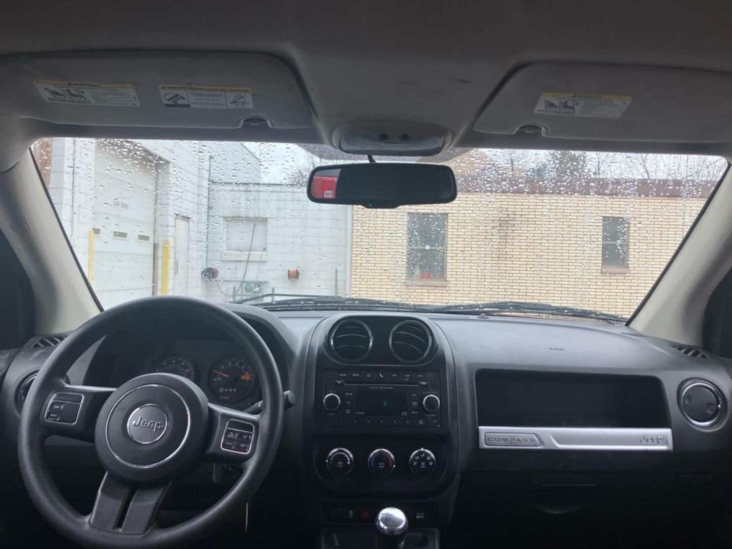 2016 RED JEEP COMPASS SPORT (1C4NJCBA9GD) with an 2.0L engine, Continuously Variable transmission, located at 1708 Broadway, Rockford, IL, 61104, (815) 397-5010, 42.252522, -89.069359 - Photo#5