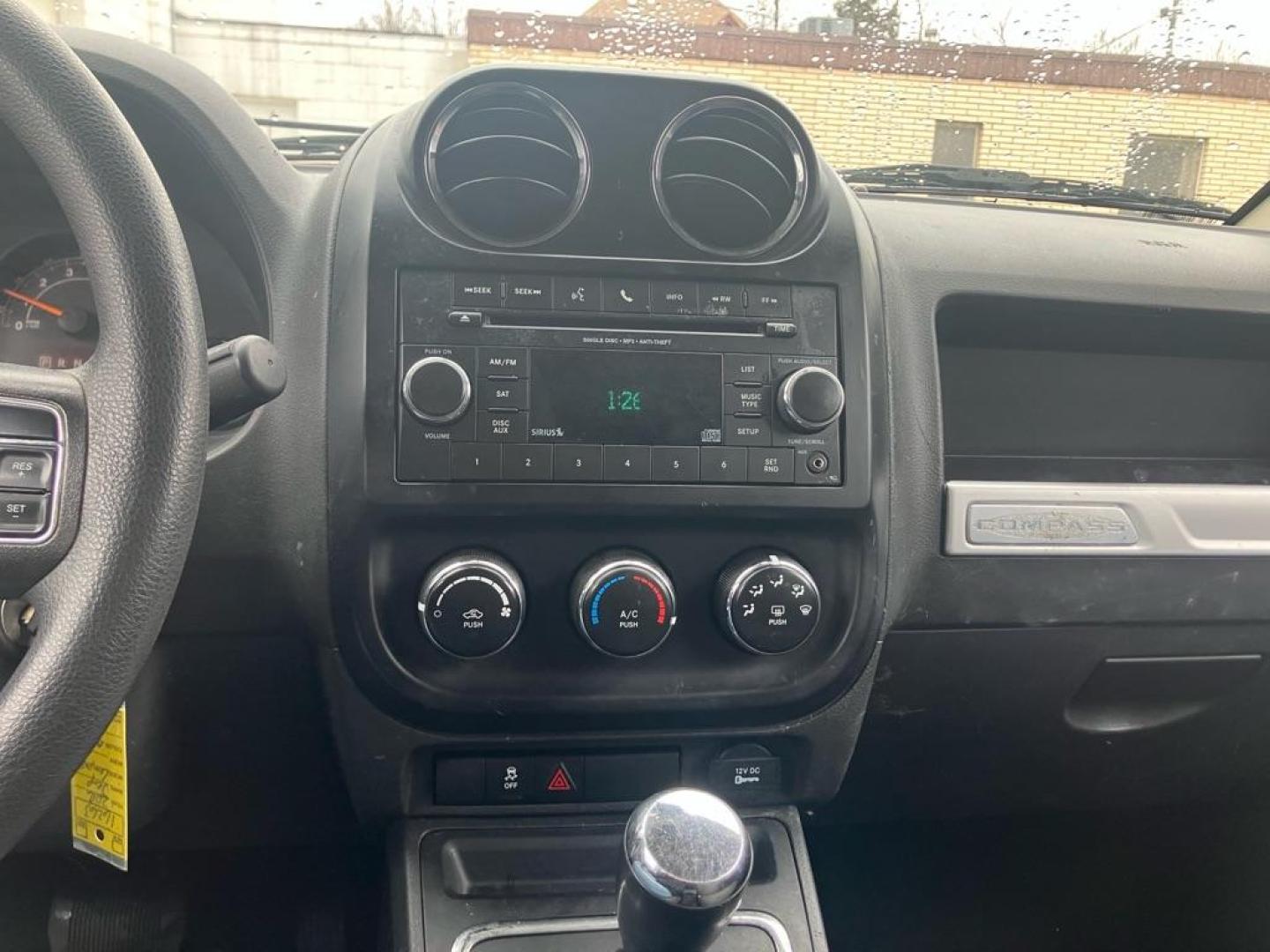 2016 RED JEEP COMPASS SPORT (1C4NJCBA9GD) with an 2.0L engine, Continuously Variable transmission, located at 1708 Broadway, Rockford, IL, 61104, (815) 397-5010, 42.252522, -89.069359 - Photo#8