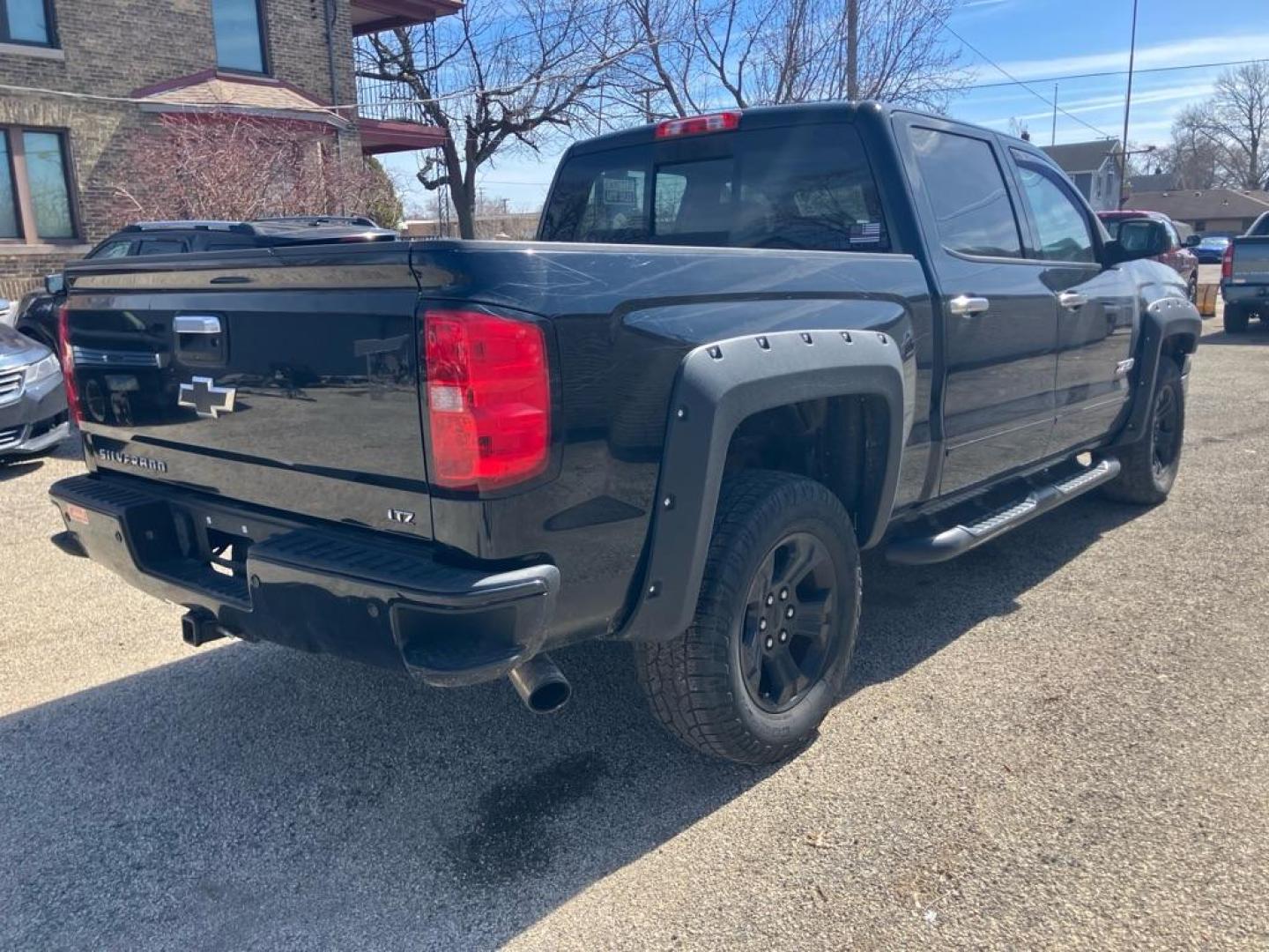2015 BLACK CHEVROLET SILVERADO 1500 LTZ (3GCUKSEC2FG) with an 5.3L engine, Automatic transmission, located at 1708 Broadway, Rockford, IL, 61104, (815) 397-5010, 42.252522, -89.069359 - Photo#2