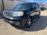 2012 BLACK HONDA PILOT TOURING (5FNYF4H98CB) with an 3.5L engine, Automatic transmission, located at 1708 Broadway, Rockford, IL, 61104, (815) 397-5010, 42.252522, -89.069359 - Photo#0