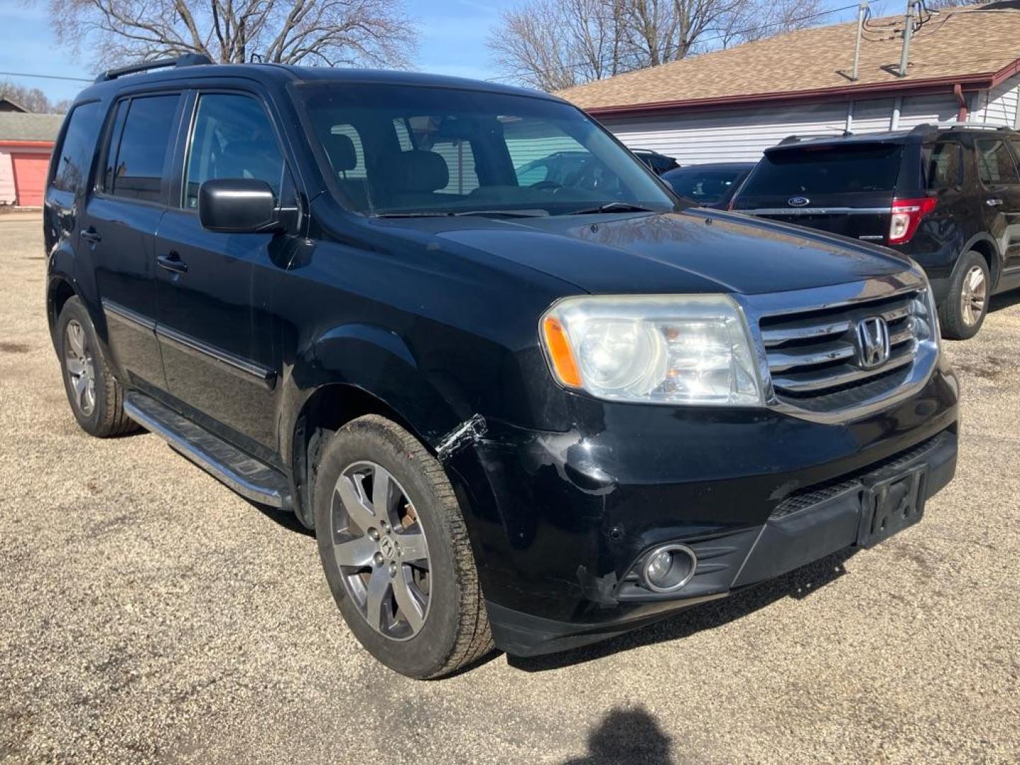 2012 BLACK HONDA PILOT TOURING (5FNYF4H98CB) with an 3.5L engine, Automatic transmission, located at 1708 Broadway, Rockford, IL, 61104, (815) 397-5010, 42.252522, -89.069359 - Photo#1