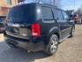 2012 BLACK HONDA PILOT TOURING (5FNYF4H98CB) with an 3.5L engine, Automatic transmission, located at 1708 Broadway, Rockford, IL, 61104, (815) 397-5010, 42.252522, -89.069359 - Photo#2