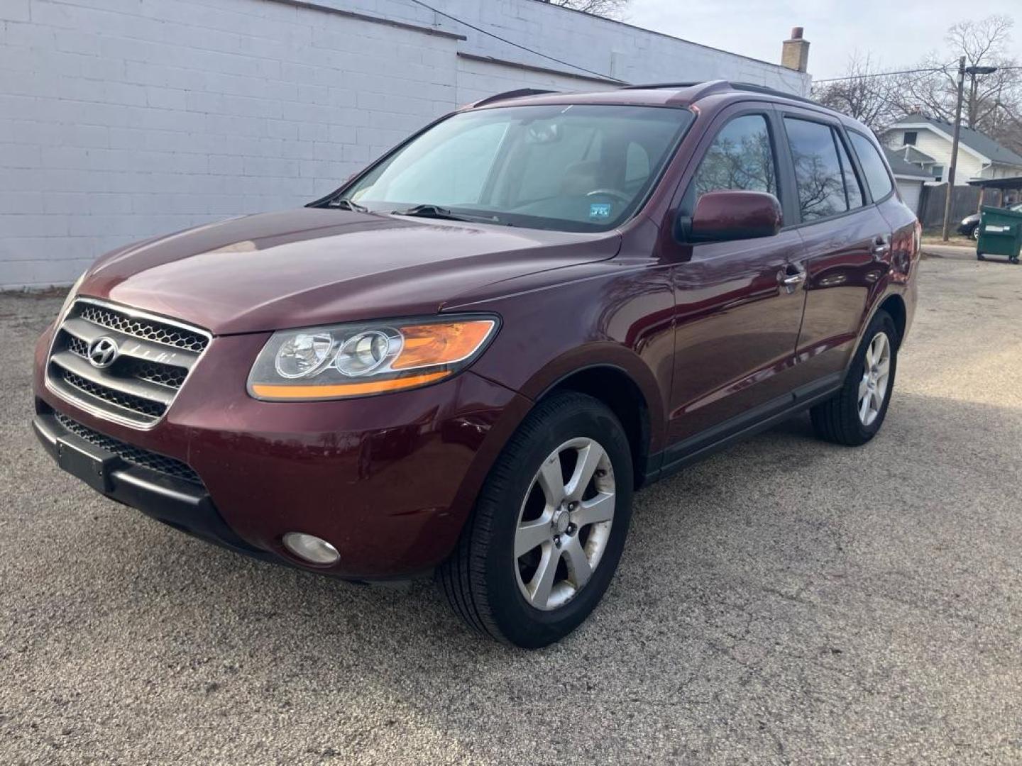 2009 MAROON HYUNDAI SANTA FE SE (5NMSH13E09H) with an 3.3L engine, Automatic transmission, located at 1708 Broadway, Rockford, IL, 61104, (815) 397-5010, 42.252522, -89.069359 - Photo#0
