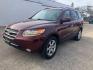 2009 MAROON HYUNDAI SANTA FE SE (5NMSH13E09H) with an 3.3L engine, Automatic transmission, located at 1708 Broadway, Rockford, IL, 61104, (815) 397-5010, 42.252522, -89.069359 - Photo#0