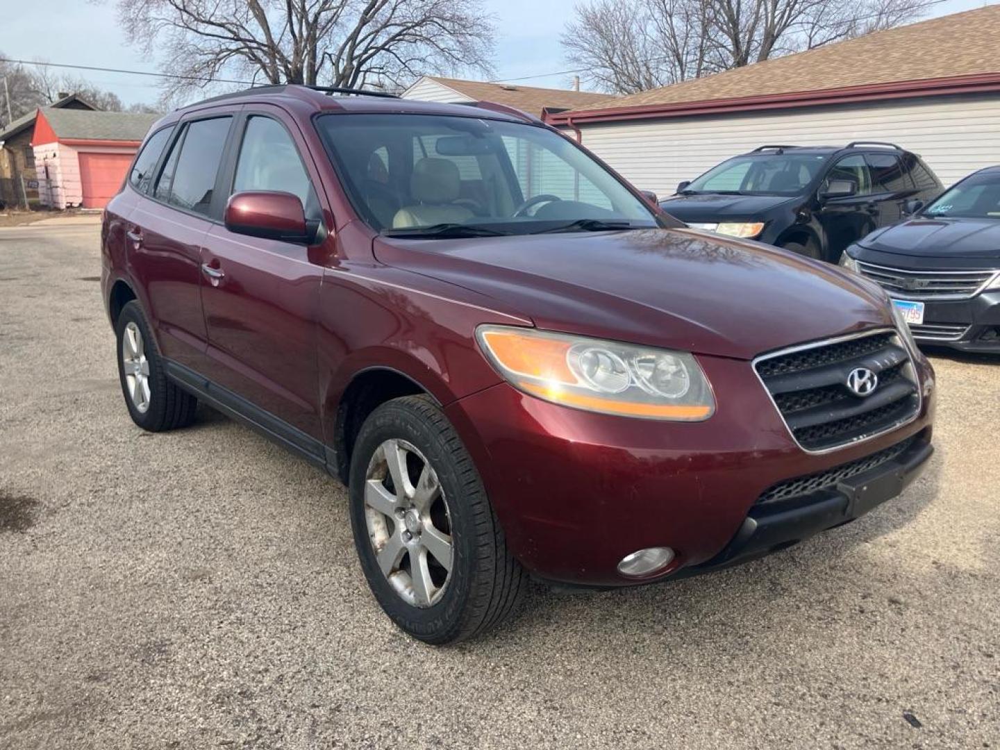 2009 MAROON HYUNDAI SANTA FE SE (5NMSH13E09H) with an 3.3L engine, Automatic transmission, located at 1708 Broadway, Rockford, IL, 61104, (815) 397-5010, 42.252522, -89.069359 - Photo#1