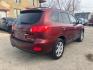 2009 MAROON HYUNDAI SANTA FE SE (5NMSH13E09H) with an 3.3L engine, Automatic transmission, located at 1708 Broadway, Rockford, IL, 61104, (815) 397-5010, 42.252522, -89.069359 - Photo#2