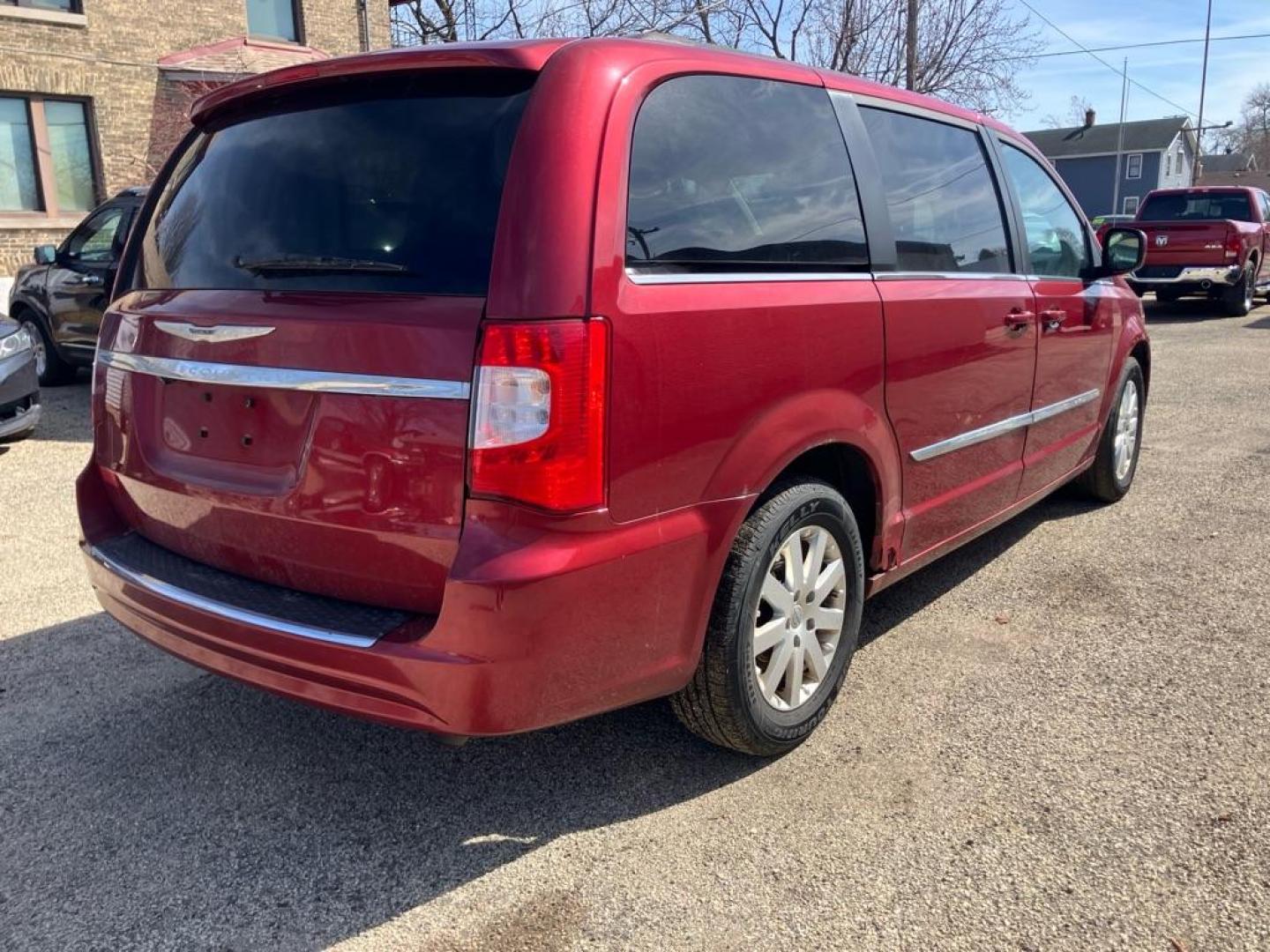 2012 RED CHRYSLER TOWN and COUNTRY TOURING (2C4RC1BG1CR) with an 3.6L engine, Automatic transmission, located at 1708 Broadway, Rockford, IL, 61104, (815) 397-5010, 42.252522, -89.069359 - Photo#2