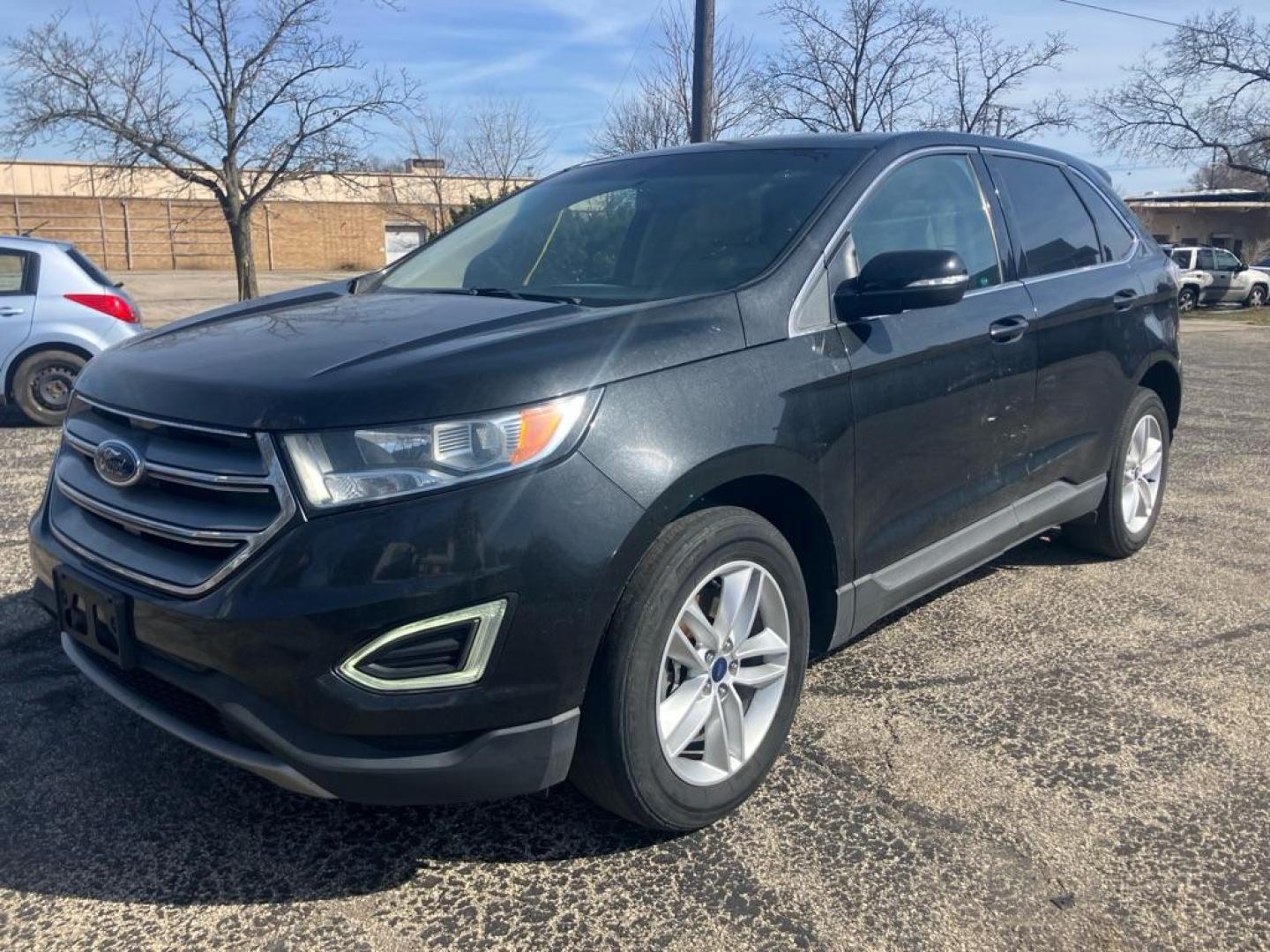 2015 BLACK FORD EDGE SEL (2FMTK4J82FB) with an 3.5L engine, Automatic transmission, located at 1708 Broadway, Rockford, IL, 61104, (815) 397-5010, 42.252522, -89.069359 - Photo#0