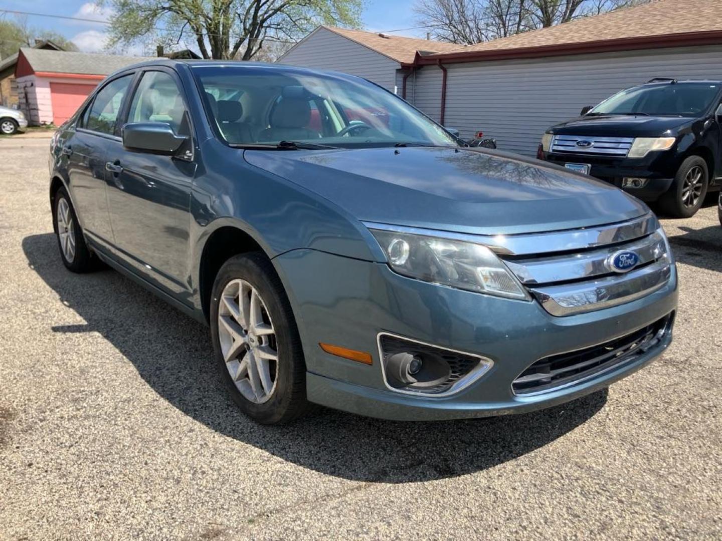2011 BLUE FORD FUSION SEL (3FAHP0JA2BR) with an 2.5L engine, Automatic transmission, located at 1708 Broadway, Rockford, IL, 61104, (815) 397-5010, 42.252522, -89.069359 - Photo#1
