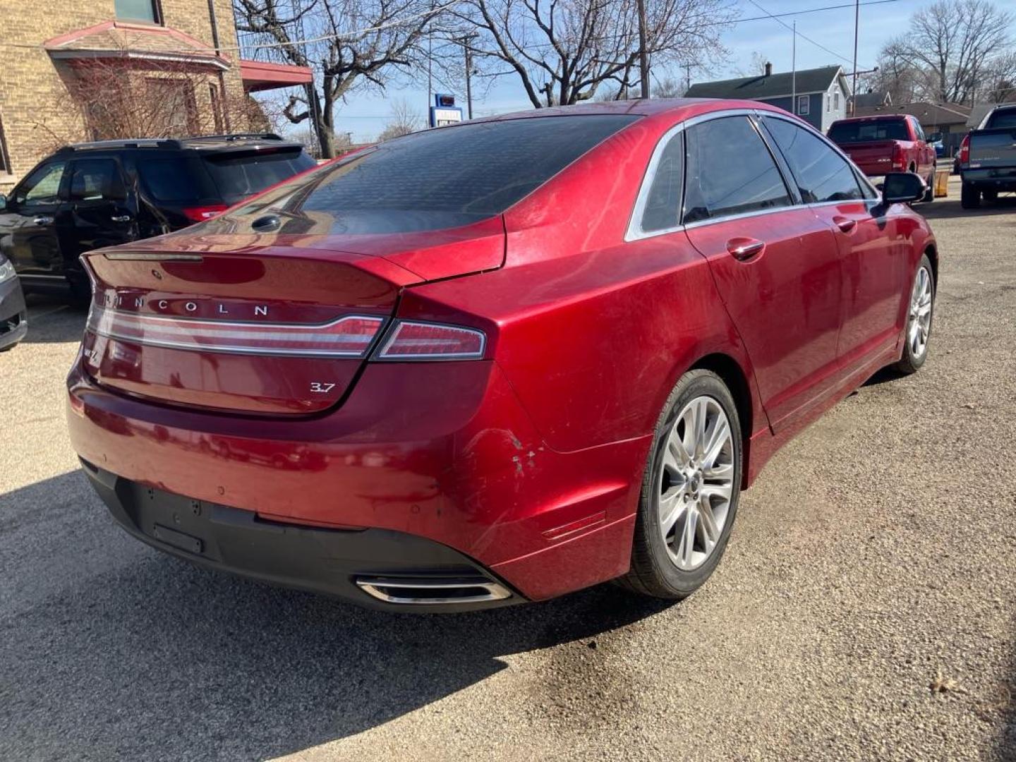 2014 RED LINCOLN MKZ (3LN6L2GK1ER) with an 3.7L engine, Automatic transmission, located at 1708 Broadway, Rockford, IL, 61104, (815) 397-5010, 42.252522, -89.069359 - Photo#2