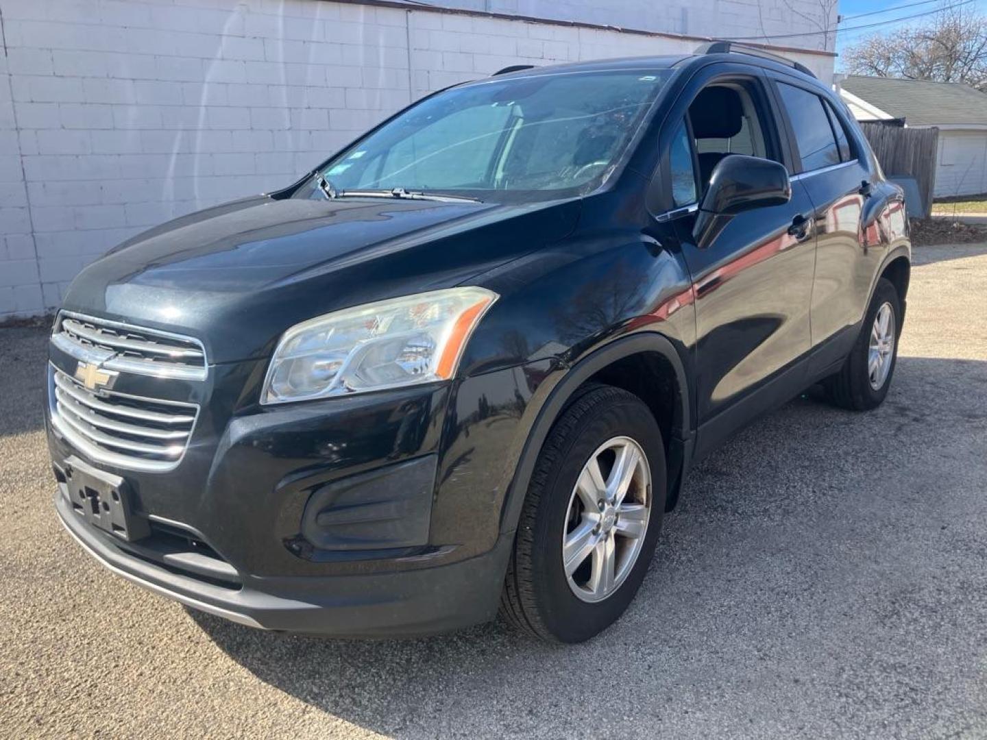 2015 BLACK CHEVROLET TRAX 1LT (3GNCJRSB5FL) with an 1.4L engine, Automatic transmission, located at 1708 Broadway, Rockford, IL, 61104, (815) 397-5010, 42.252522, -89.069359 - Photo#0