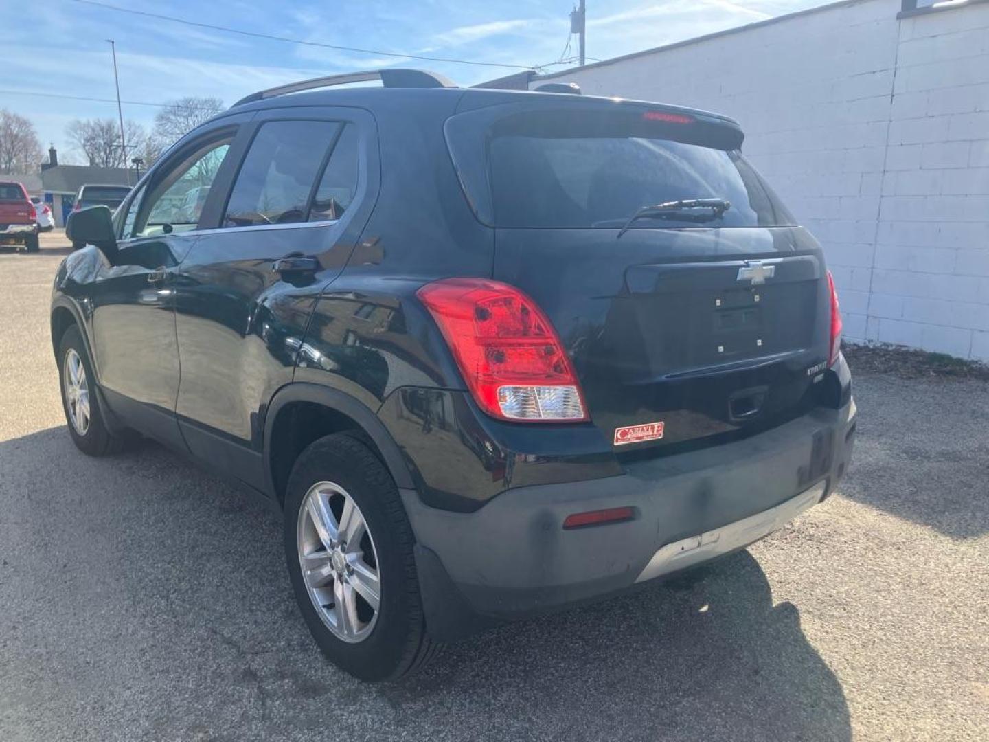 2015 BLACK CHEVROLET TRAX 1LT (3GNCJRSB5FL) with an 1.4L engine, Automatic transmission, located at 1708 Broadway, Rockford, IL, 61104, (815) 397-5010, 42.252522, -89.069359 - Photo#3