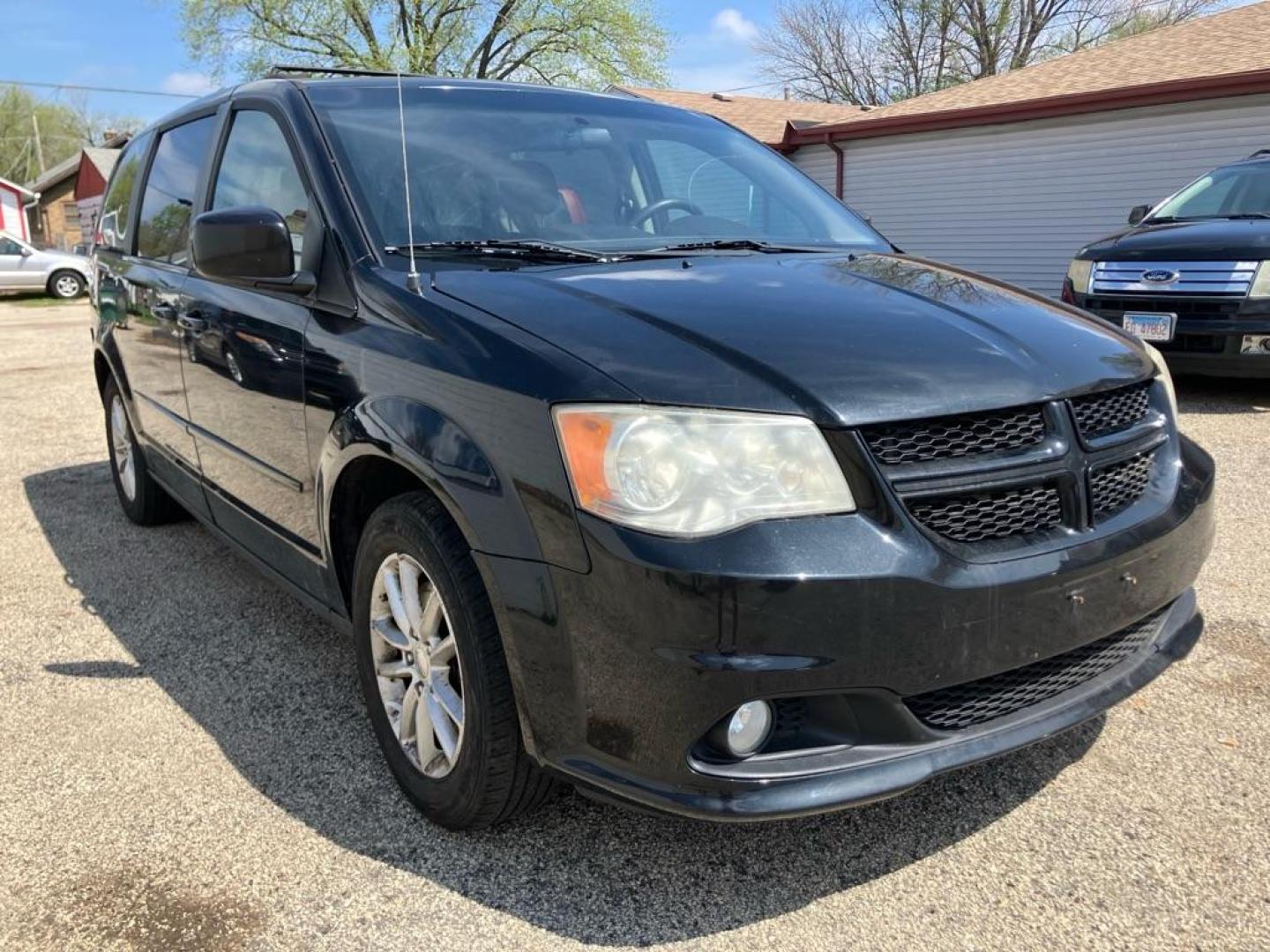 2014 BLACK DODGE GRAND CARAVAN SXT (2C4RDGCG4ER) with an 3.6L engine, Automatic transmission, located at 1708 Broadway, Rockford, IL, 61104, (815) 397-5010, 42.252522, -89.069359 - Photo#0