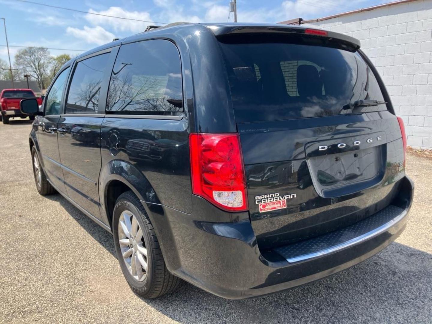 2014 BLACK DODGE GRAND CARAVAN SXT (2C4RDGCG4ER) with an 3.6L engine, Automatic transmission, located at 1708 Broadway, Rockford, IL, 61104, (815) 397-5010, 42.252522, -89.069359 - Photo#3