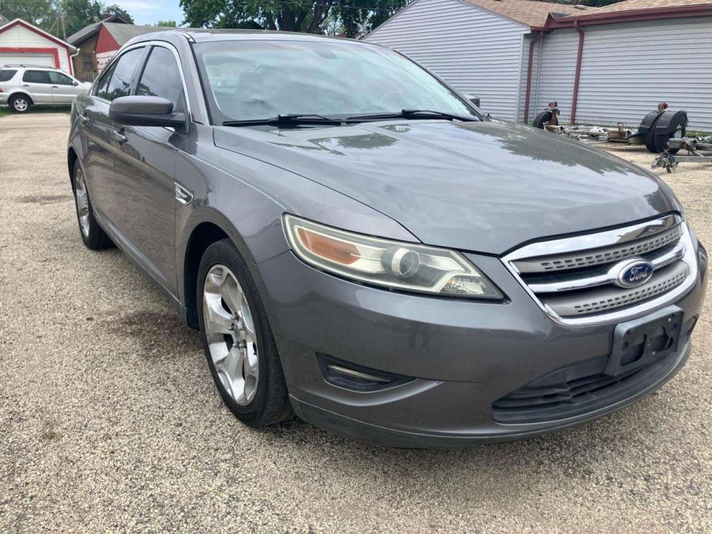 2011 GRAY FORD TAURUS SEL (1FAHP2HW0BG) with an 3.5L engine, Automatic transmission, located at 1708 Broadway, Rockford, IL, 61104, (815) 397-5010, 42.252522, -89.069359 - Photo#1