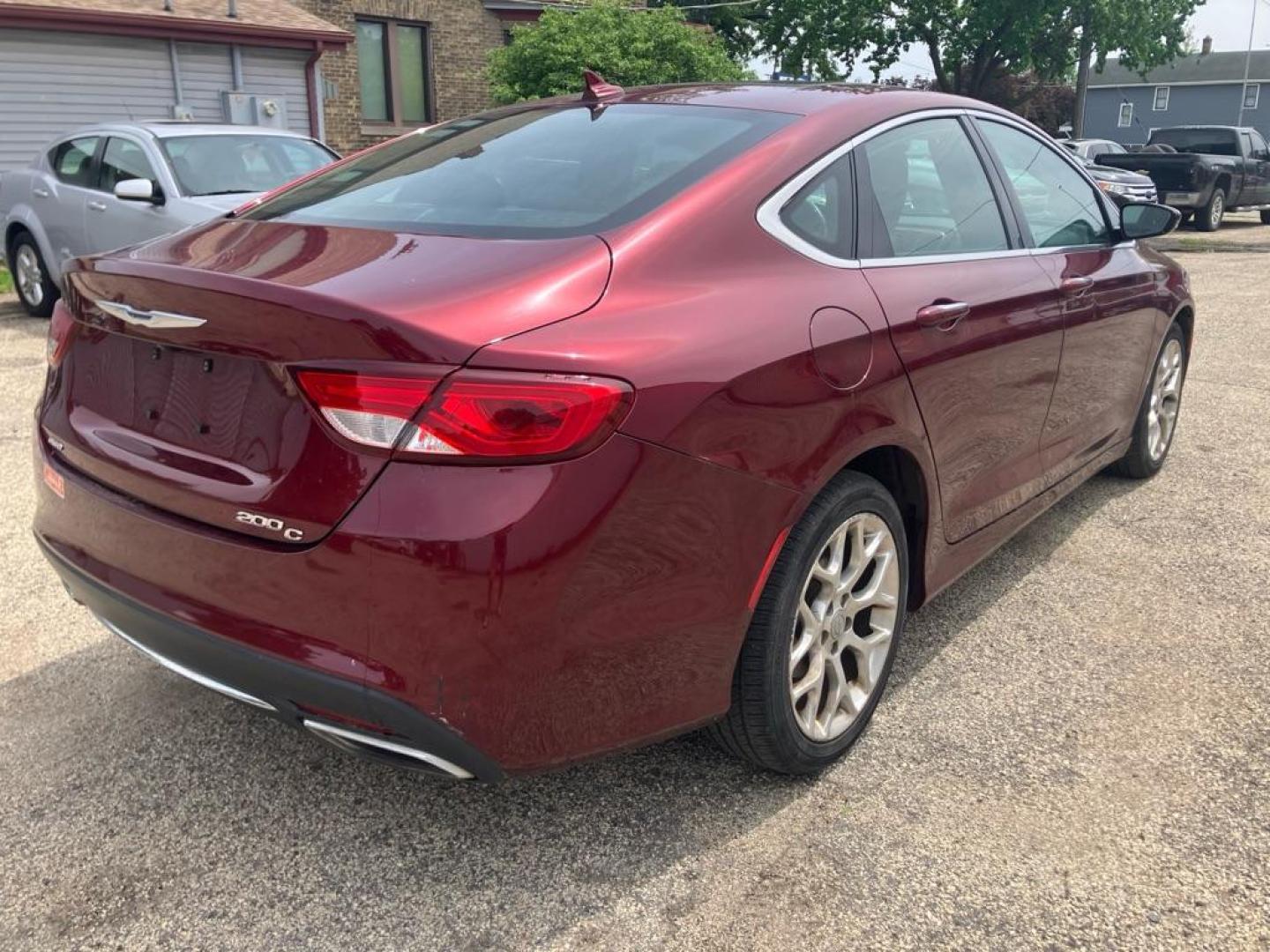 2015 RED CHRYSLER 200 C (1C3CCCEG6FN) with an 3.6L engine, Automatic transmission, located at 1708 Broadway, Rockford, IL, 61104, (815) 397-5010, 42.252522, -89.069359 - Photo#2