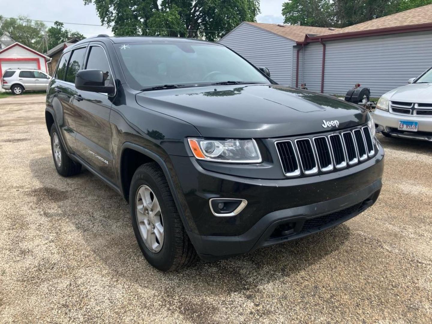 2014 BLACK JEEP GRAND CHEROKEE LAREDO (1C4RJFAG9EC) with an 3.6L engine, Automatic transmission, located at 1708 Broadway, Rockford, IL, 61104, (815) 397-5010, 42.252522, -89.069359 - Photo#1