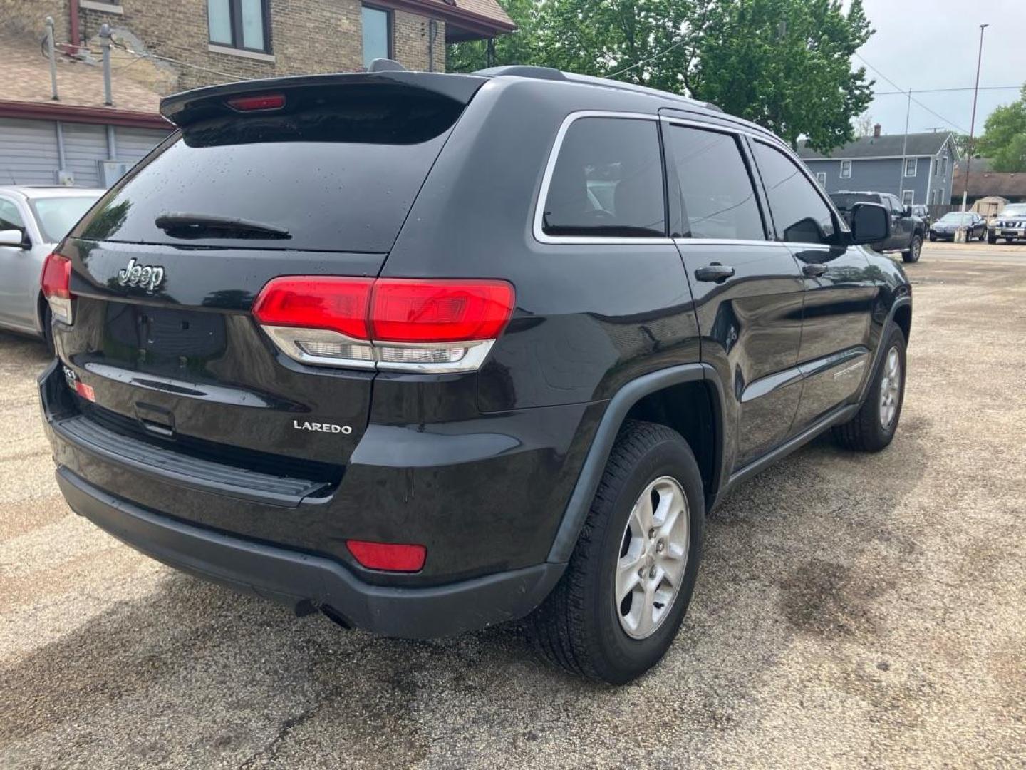 2014 BLACK JEEP GRAND CHEROKEE LAREDO (1C4RJFAG9EC) with an 3.6L engine, Automatic transmission, located at 1708 Broadway, Rockford, IL, 61104, (815) 397-5010, 42.252522, -89.069359 - Photo#2