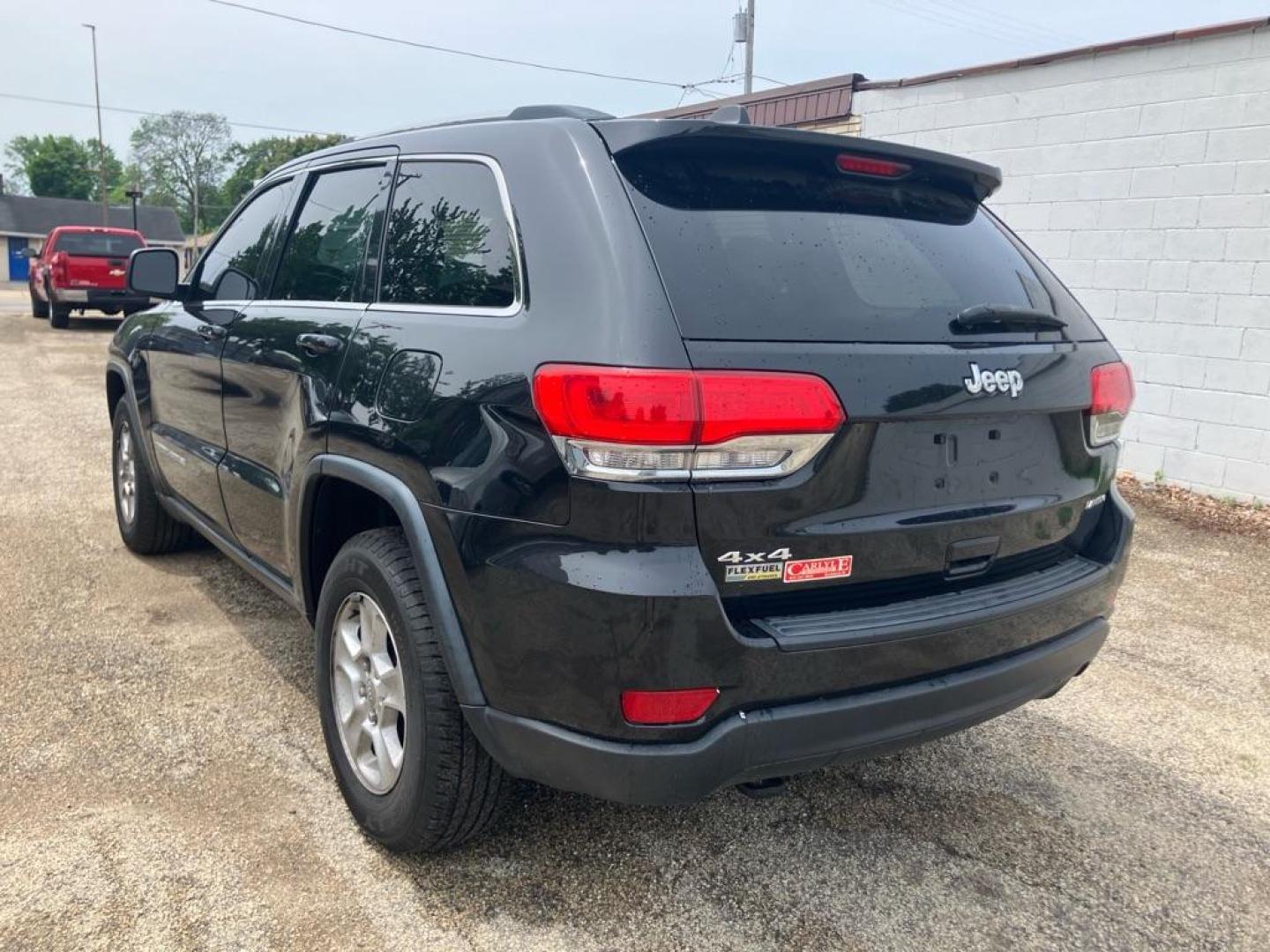 2014 BLACK JEEP GRAND CHEROKEE LAREDO (1C4RJFAG9EC) with an 3.6L engine, Automatic transmission, located at 1708 Broadway, Rockford, IL, 61104, (815) 397-5010, 42.252522, -89.069359 - Photo#3