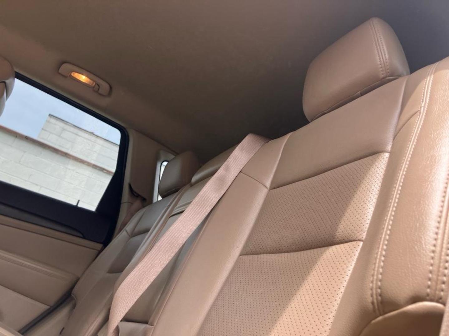 2014 BLACK JEEP GRAND CHEROKEE LAREDO (1C4RJFAG9EC) with an 3.6L engine, Automatic transmission, located at 1708 Broadway, Rockford, IL, 61104, (815) 397-5010, 42.252522, -89.069359 - Photo#4