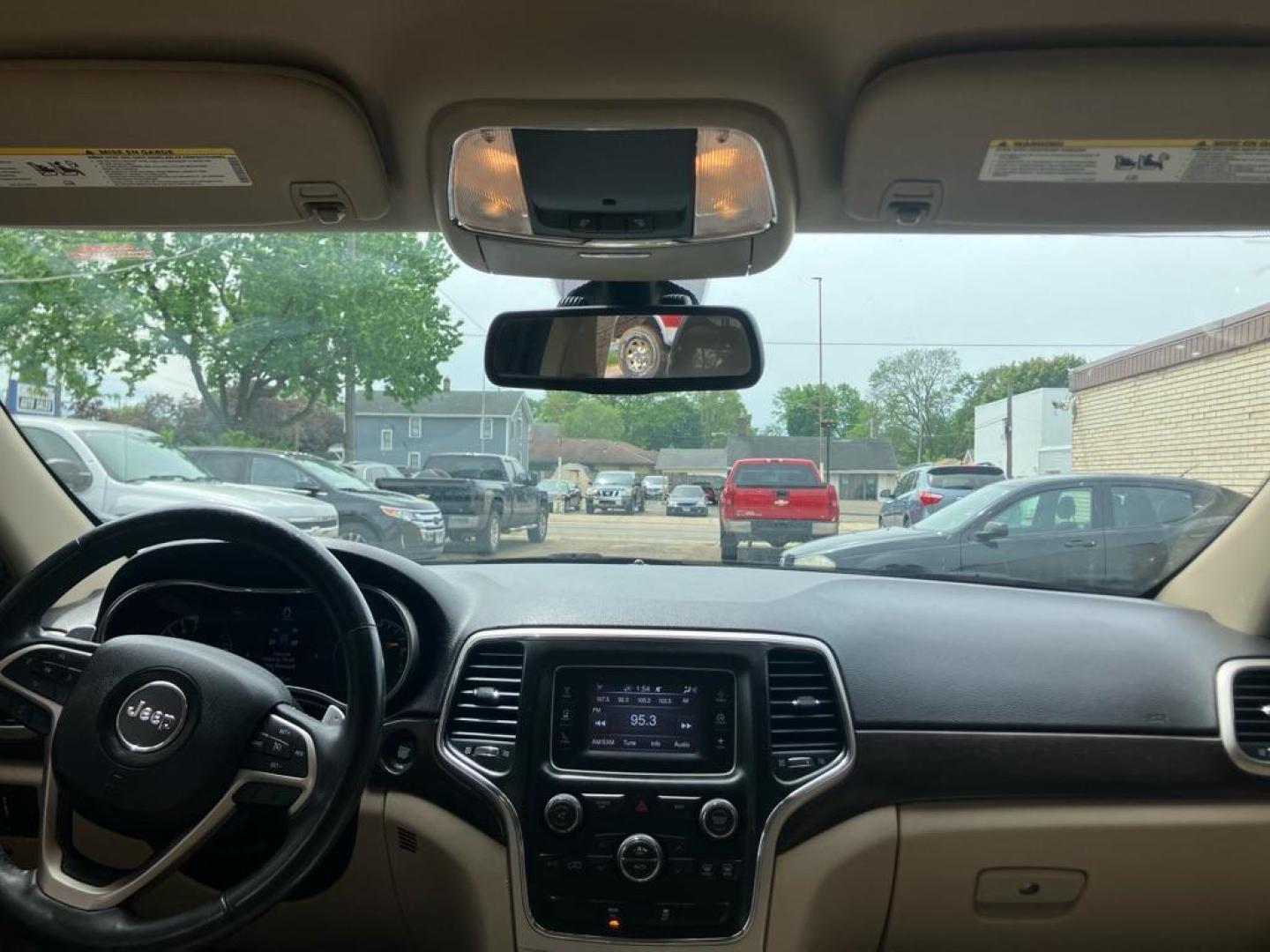 2014 BLACK JEEP GRAND CHEROKEE LAREDO (1C4RJFAG9EC) with an 3.6L engine, Automatic transmission, located at 1708 Broadway, Rockford, IL, 61104, (815) 397-5010, 42.252522, -89.069359 - Photo#5
