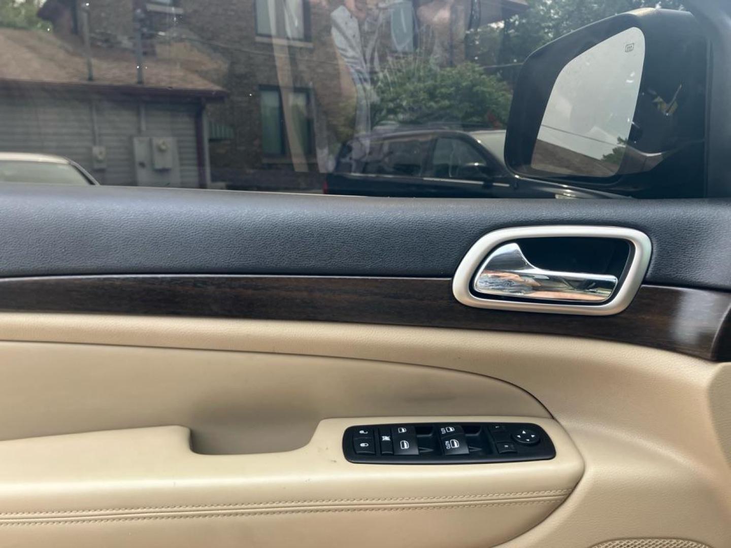 2014 BLACK JEEP GRAND CHEROKEE LAREDO (1C4RJFAG9EC) with an 3.6L engine, Automatic transmission, located at 1708 Broadway, Rockford, IL, 61104, (815) 397-5010, 42.252522, -89.069359 - Photo#6