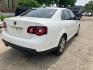 2009 WHITE VOLKSWAGEN JETTA SE (3VWRM71KX9M) with an 2.5L engine, Automatic transmission, located at 1708 Broadway, Rockford, IL, 61104, (815) 397-5010, 42.252522, -89.069359 - Photo#2
