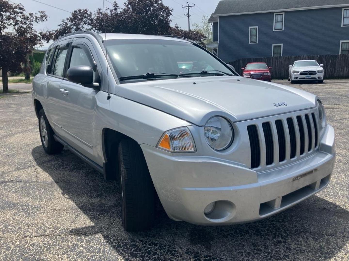 2010 SILVER JEEP COMPASS SPORT (1J4NF4FB3AD) with an 2.4L engine, Continuously Variable transmission, located at 1708 Broadway, Rockford, IL, 61104, (815) 397-5010, 42.252522, -89.069359 - Photo#1