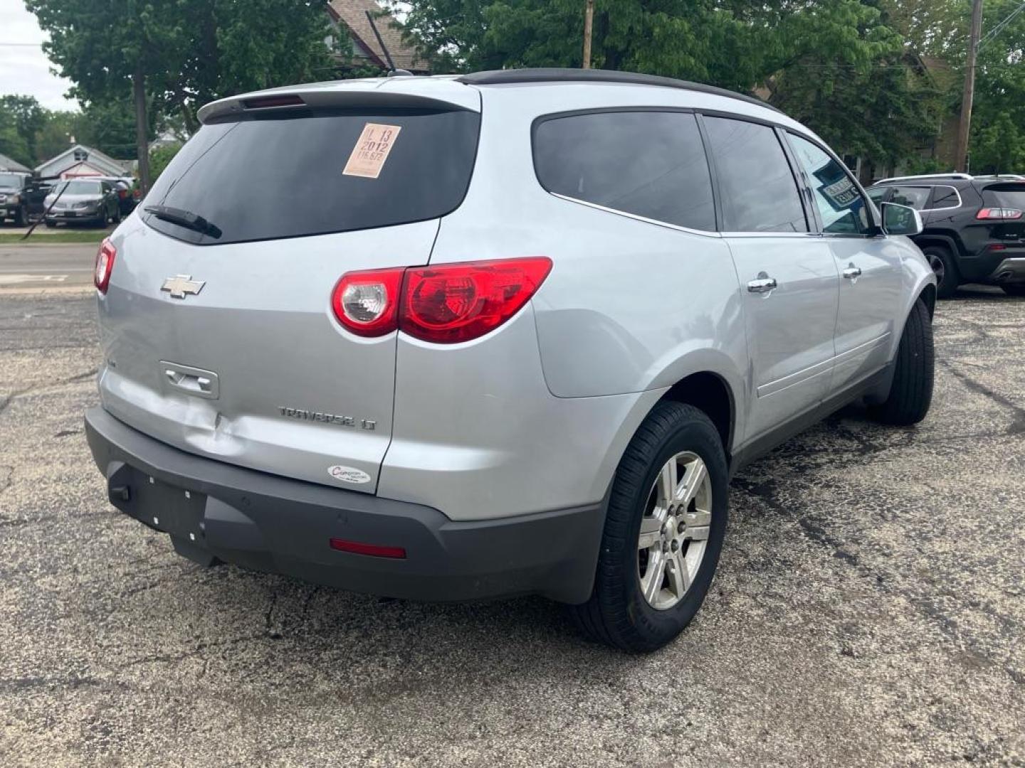 2012 SILVER CHEVROLET TRAVERSE LT (1GNKVJED2CJ) with an 3.6L engine, Automatic transmission, located at 1708 Broadway, Rockford, IL, 61104, (815) 397-5010, 42.252522, -89.069359 - Photo#2