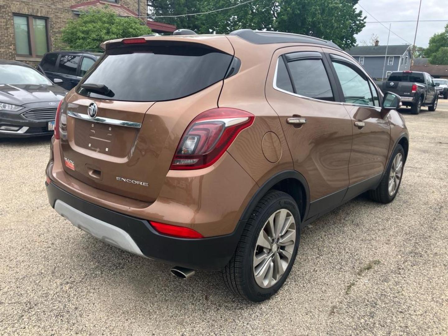 2017 BROWN BUICK ENCORE PREFERRED (KL4CJASB1HB) with an 1.4L engine, Automatic transmission, located at 1708 Broadway, Rockford, IL, 61104, (815) 397-5010, 42.252522, -89.069359 - Photo#2