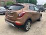 2017 BROWN BUICK ENCORE PREFERRED (KL4CJASB1HB) with an 1.4L engine, Automatic transmission, located at 1708 Broadway, Rockford, IL, 61104, (815) 397-5010, 42.252522, -89.069359 - Photo#2