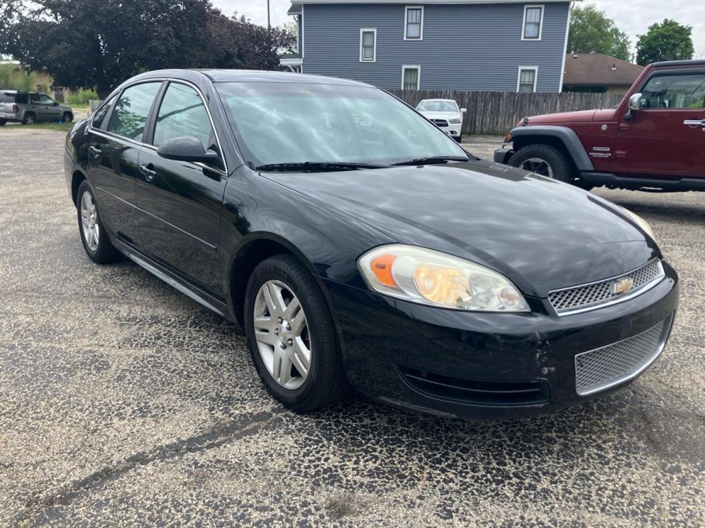 2014 BLACK CHEVROLET IMPALA LIMITED LT (2G1WB5E33E1) with an 3.6L engine, Automatic transmission, located at 1708 Broadway, Rockford, IL, 61104, (815) 397-5010, 42.252522, -89.069359 - Photo#1